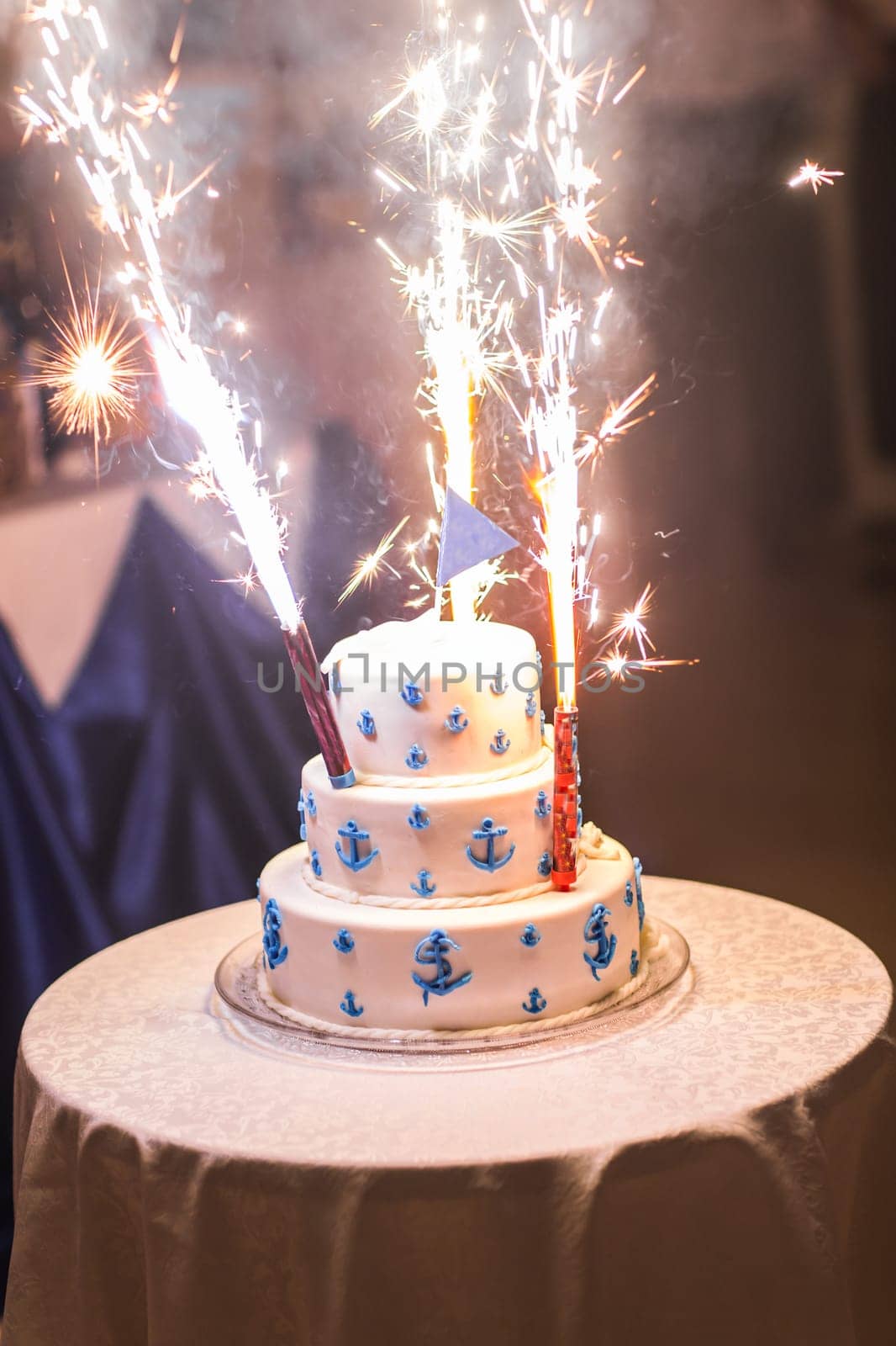 A traditional and decorative wedding cake at wedding reception.