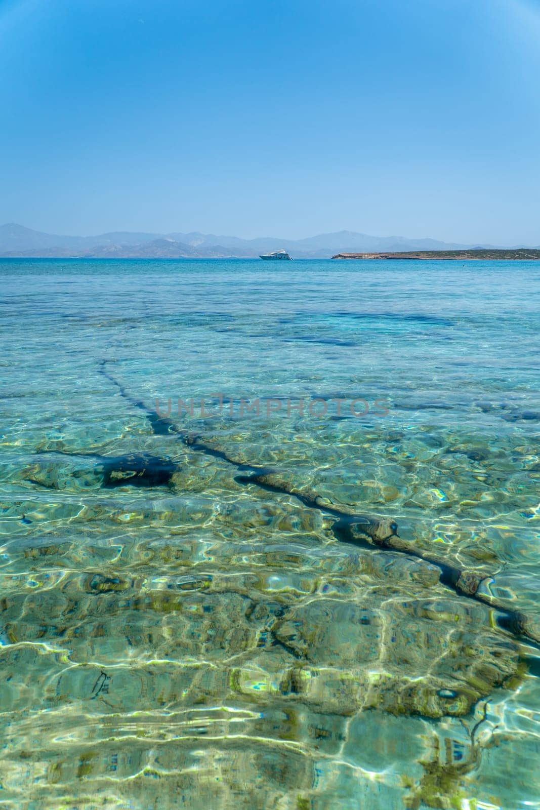 Transparent waters on a beach in Paros