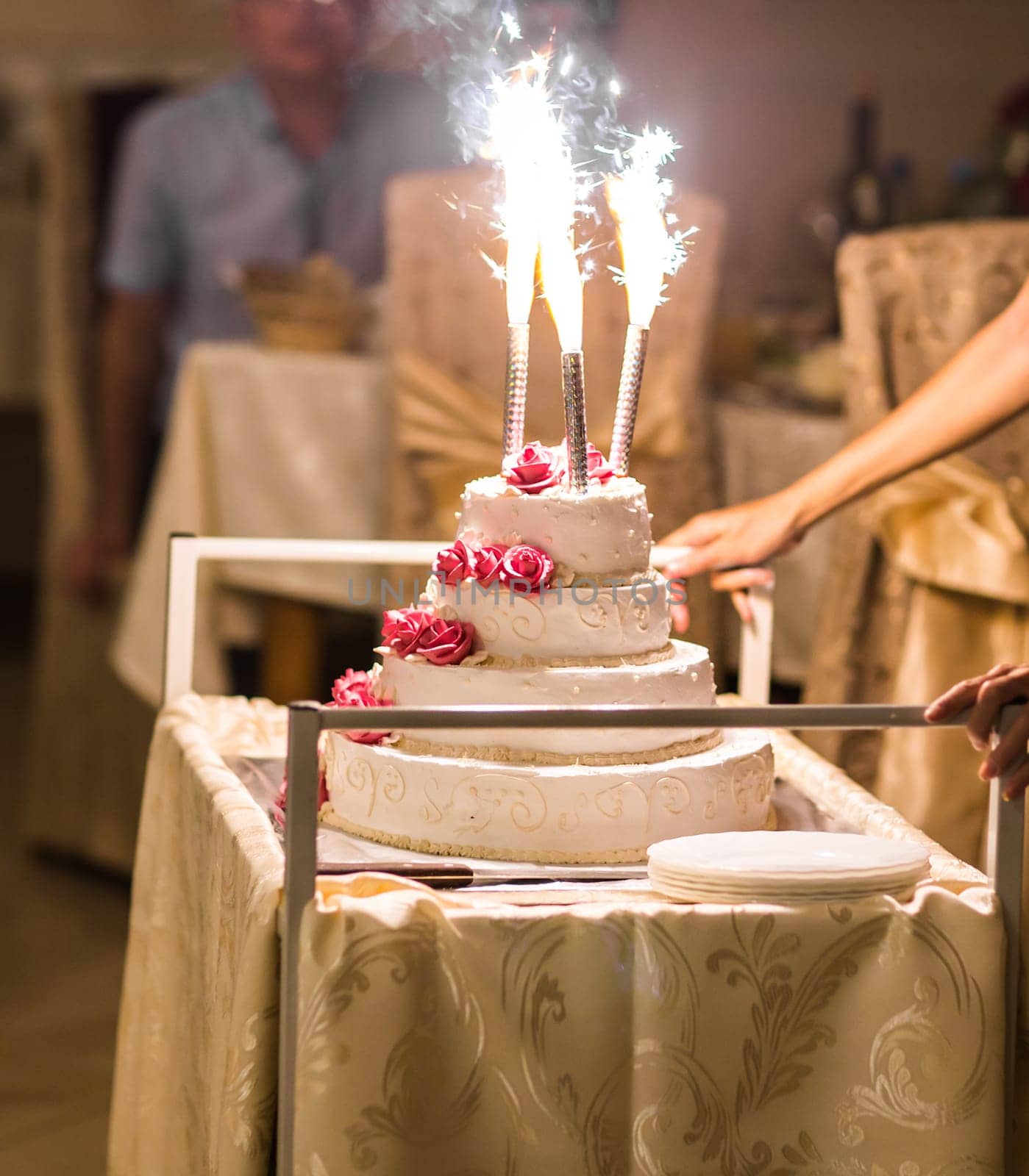 White Tasty Wedding Cake at Wedding reception