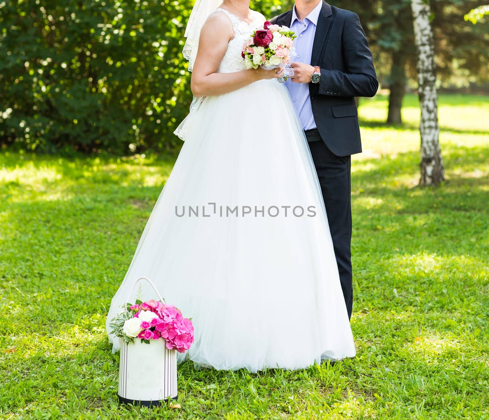 Friends of bride and groom on the wedding ceremony outdoors