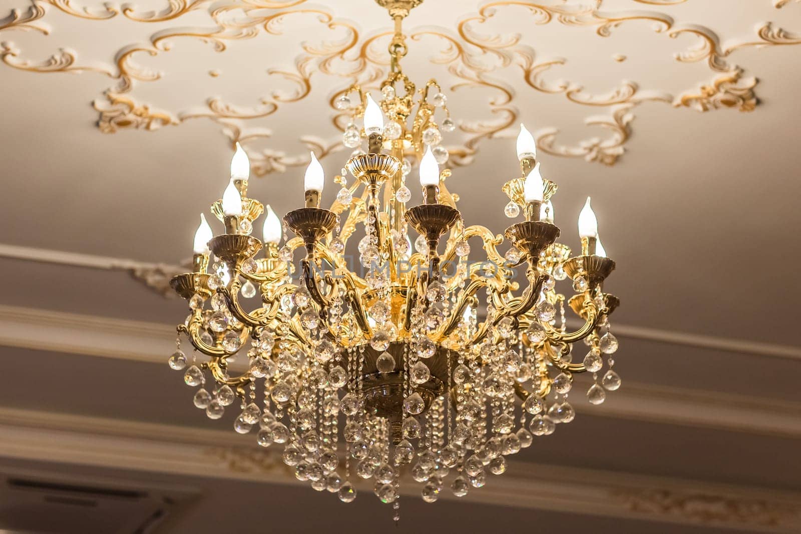 beautiful crystal chandelier in a room. lamp