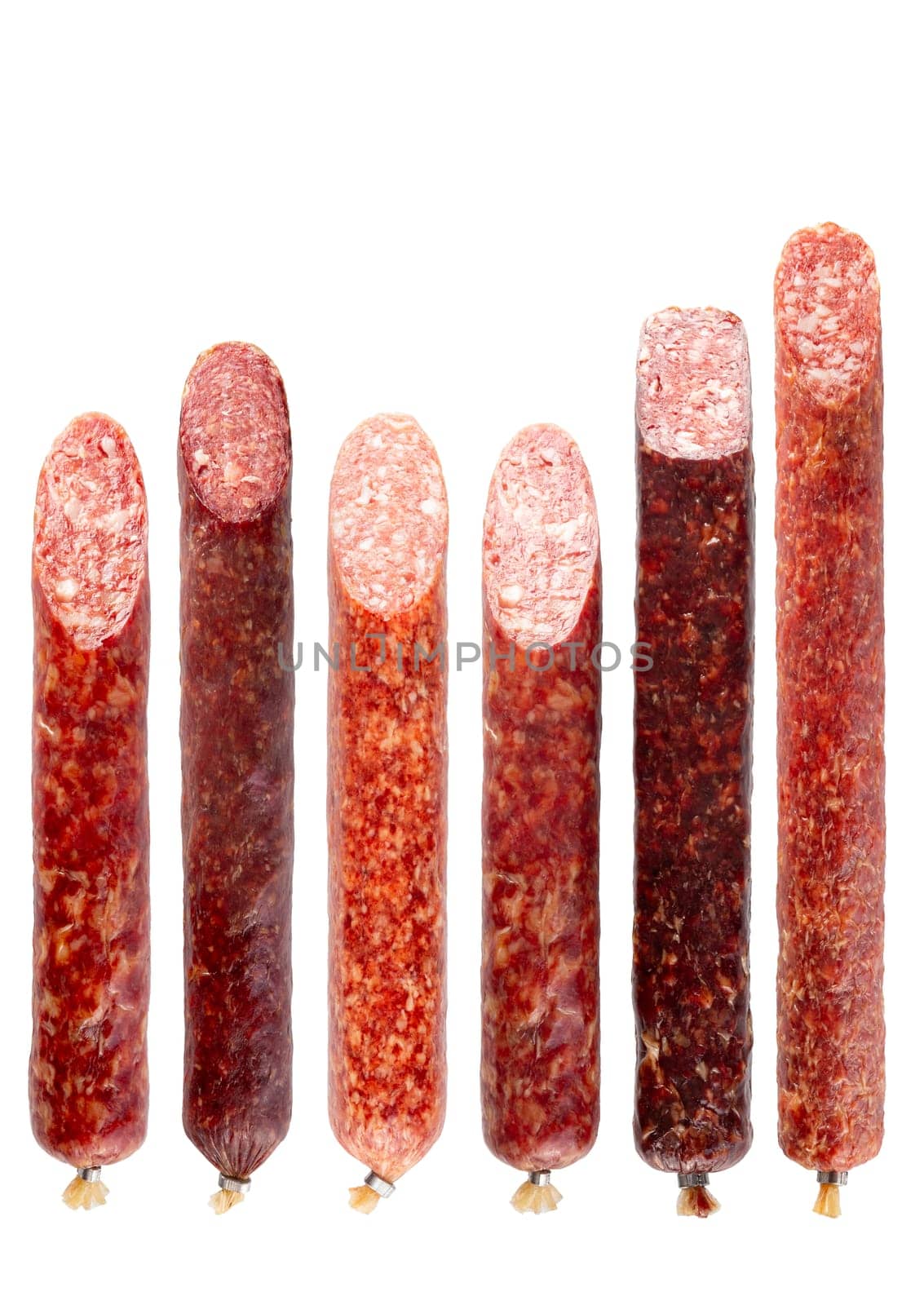 Set of smoked and cured different sausages with cut tips isolated on white background.