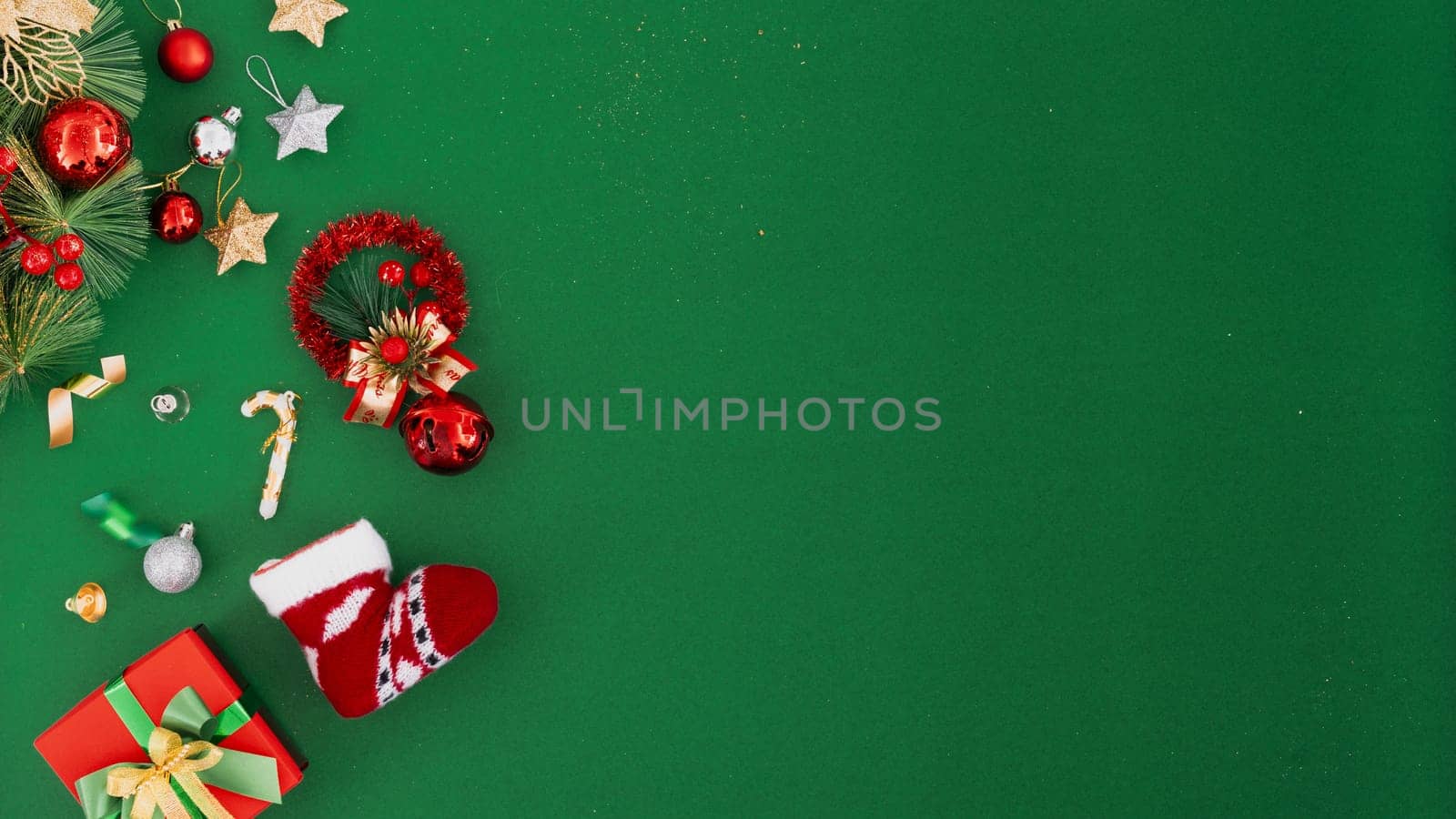 Christmas blank greeting card mock-up scene. Creative layout made of Christmas tree branches with paper card note. Flat lay. Nature New Year concept.