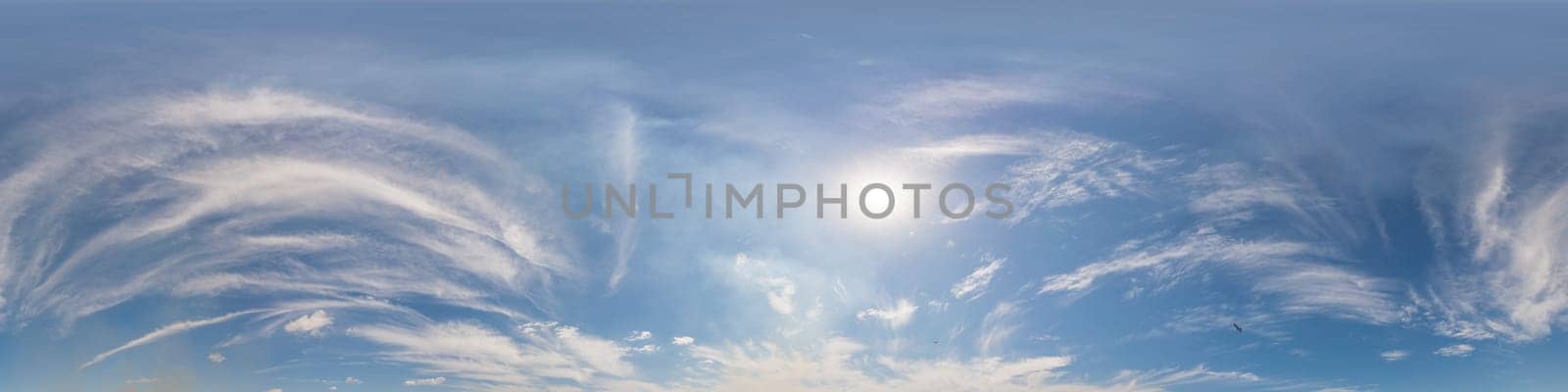 Sky panorama with Cirrus clouds in Seamless spherical equirectangular format. Full zenith for use in 3D graphics, game and editing aerial drone 360 degree panoramas for sky replacement