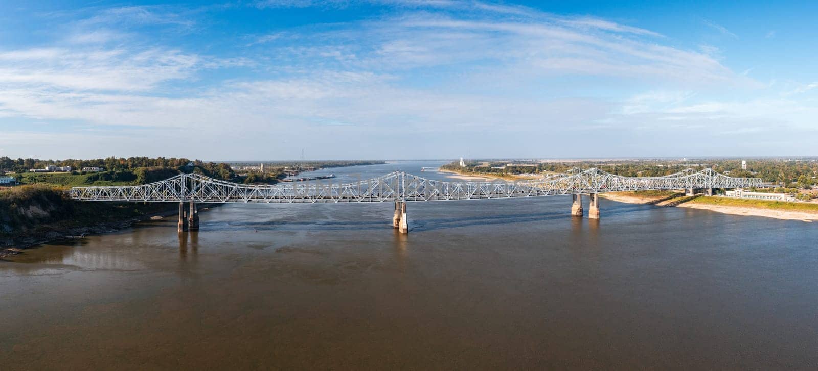 Extreme low water conditions on Mississippi river under John R Junkin bridge at Natchez MS in October 2023