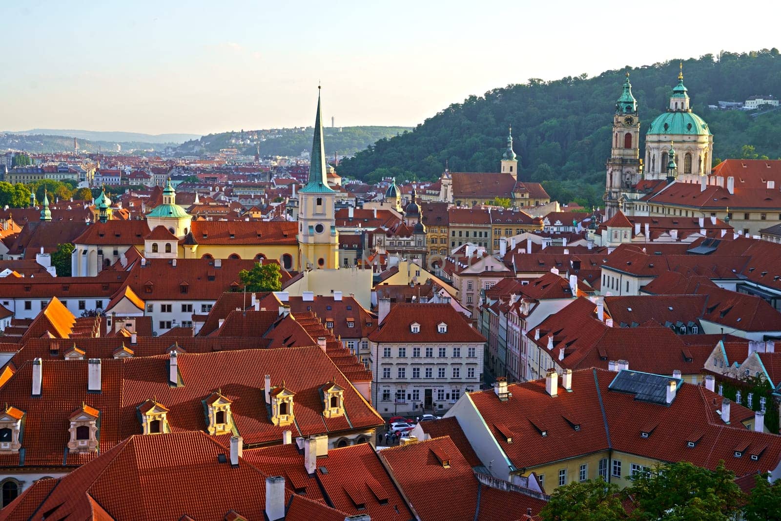 Czech Republic, Prague, September 2023: View of the red tiled roofs of the old town of Prague. Concept - tourism, travel. by aprilphoto