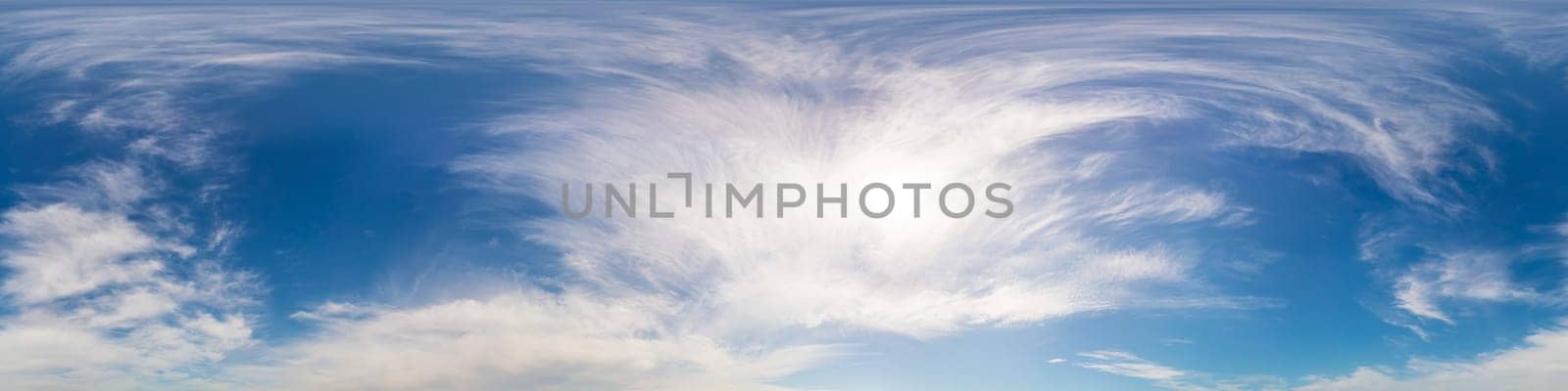 Bright sunset sky panorama with Cirrus clouds. Seamless hdr spherical equirectangular 360 panorama. Sky dome or zenith for 3D visualization, game and sky replacement for aerial drone 360 panoramas.