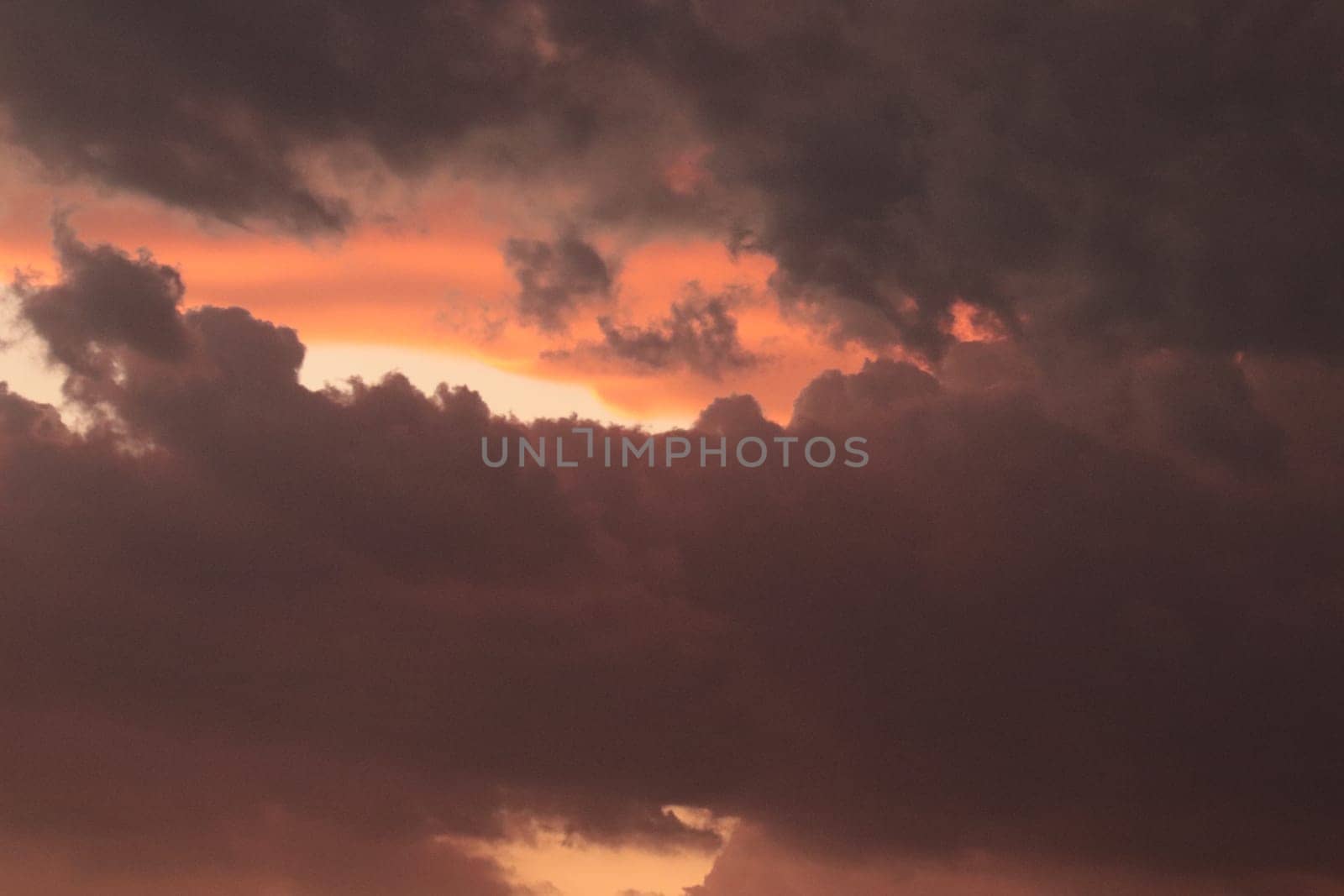 Orange, Black and white dramatic sunset sky line . High quality photo