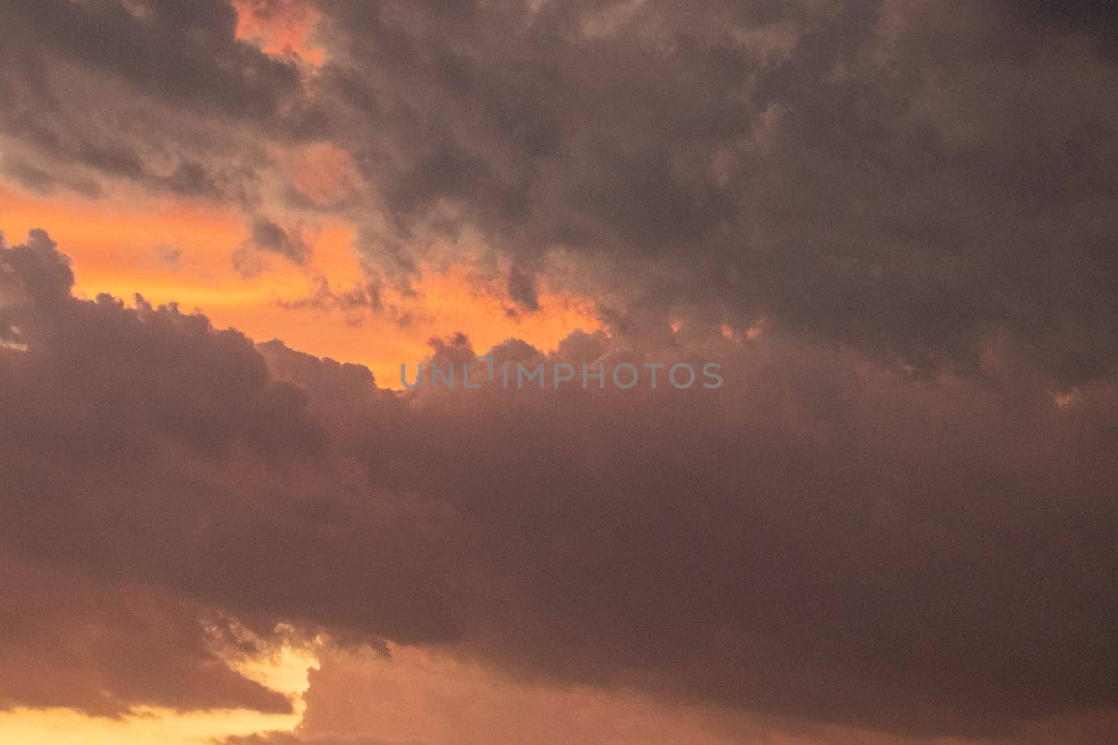 Orange, Black and white dramatic sunset sky line . High quality photo