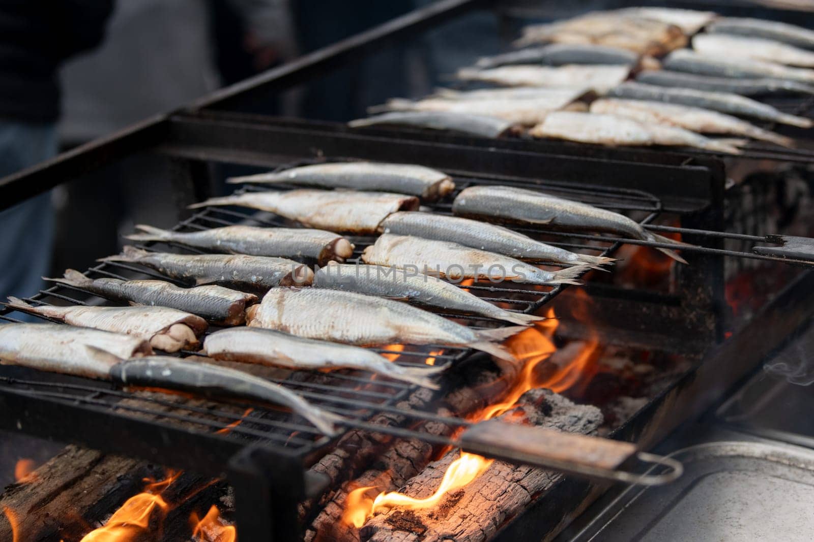 Herring on the grill on a street market