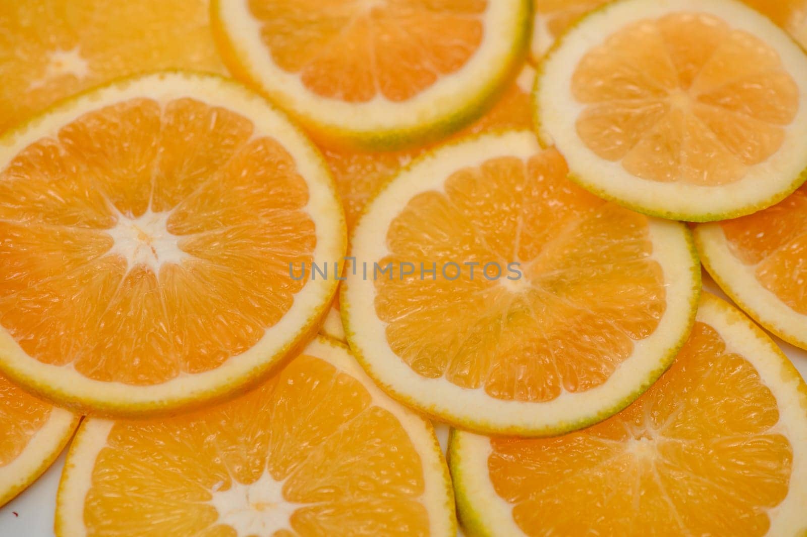 sliced ​​orange laid out on the table as a food background 14