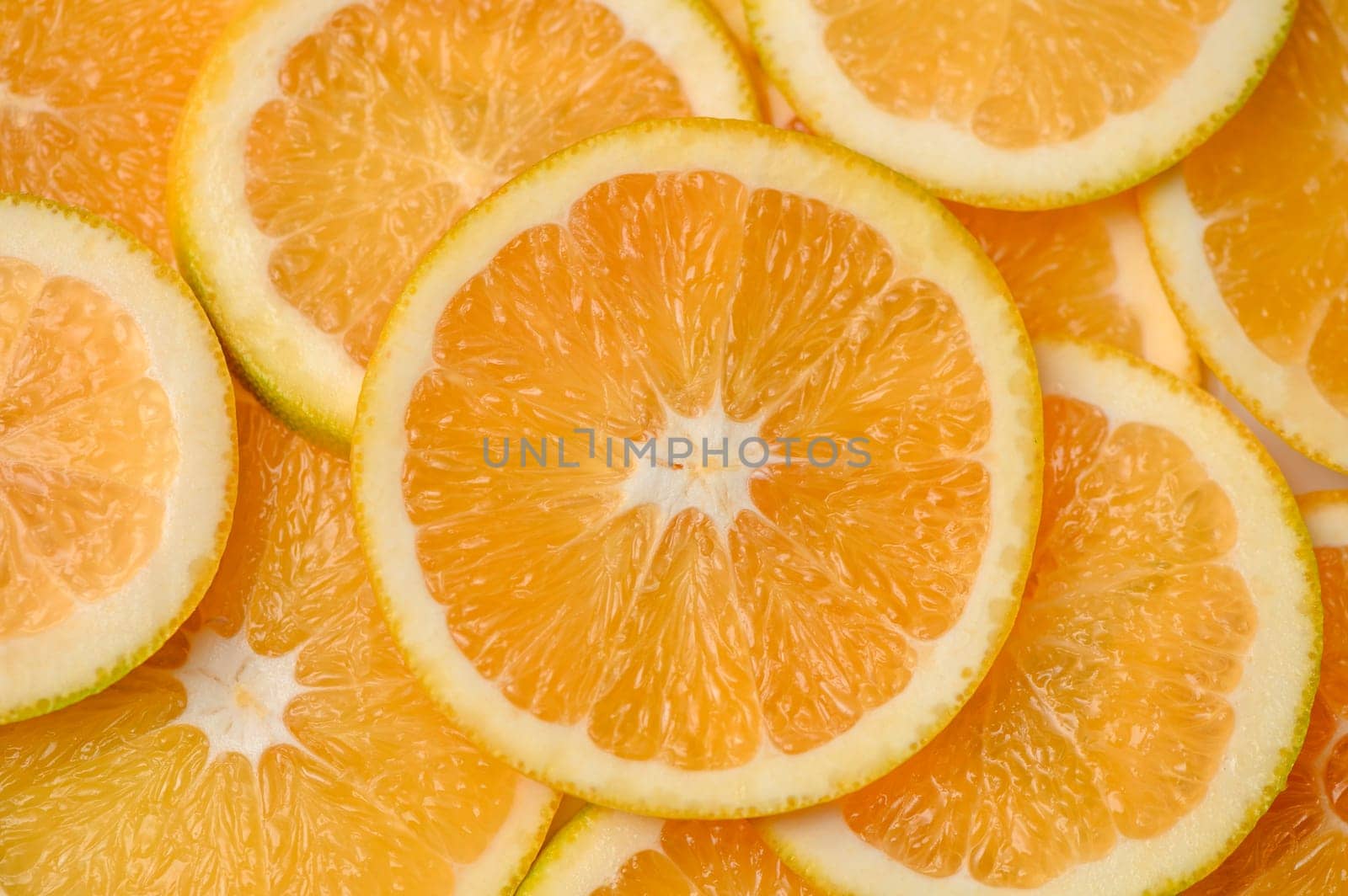 sliced ​​orange laid out on the table as a food background 9