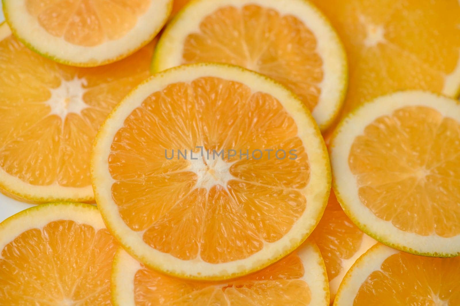 sliced ​​orange laid out on the table as a food background 7