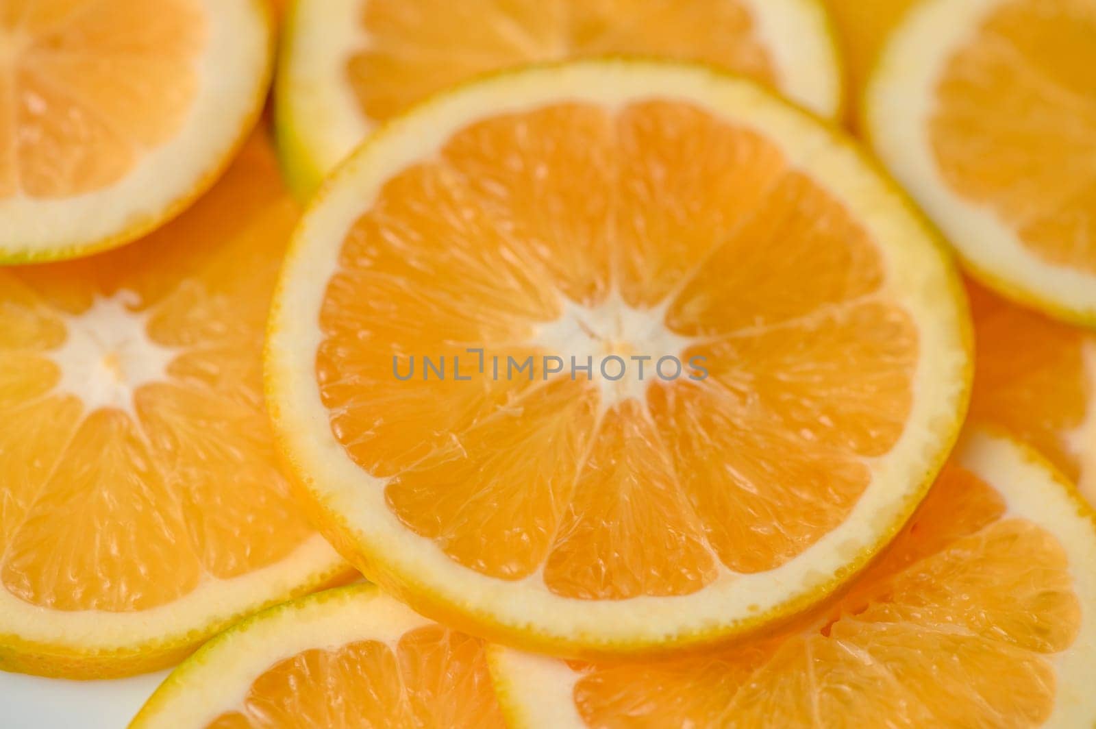 sliced ​​orange laid out on the table as a food background 6