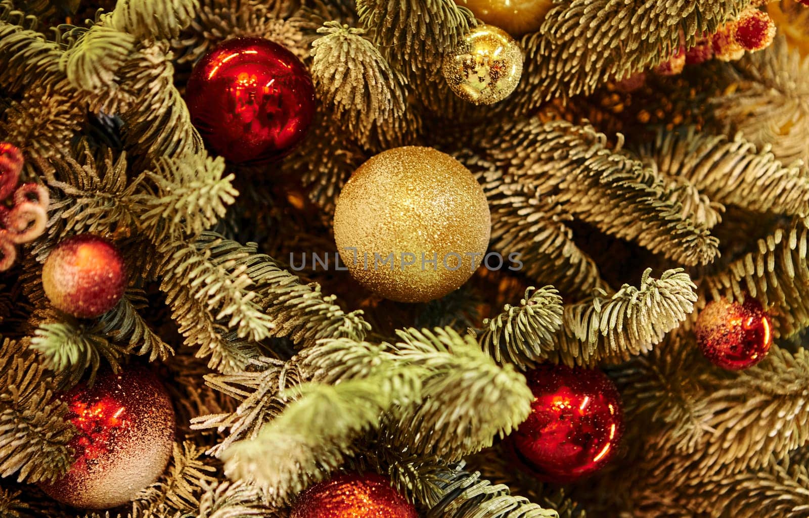 Background for Christmas and New Year's Eve. Beautiful wide angle holiday template with Christmas ball on the tree and glare.