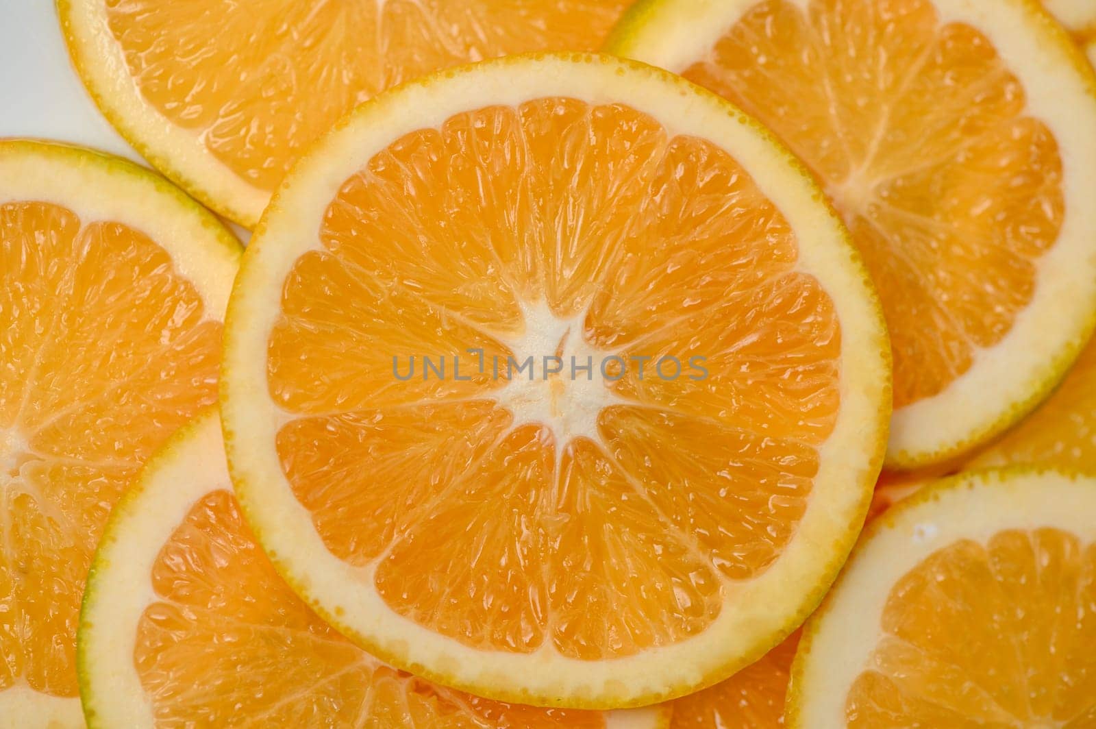 sliced ​​orange laid out on the table as a food background 10 by Mixa74