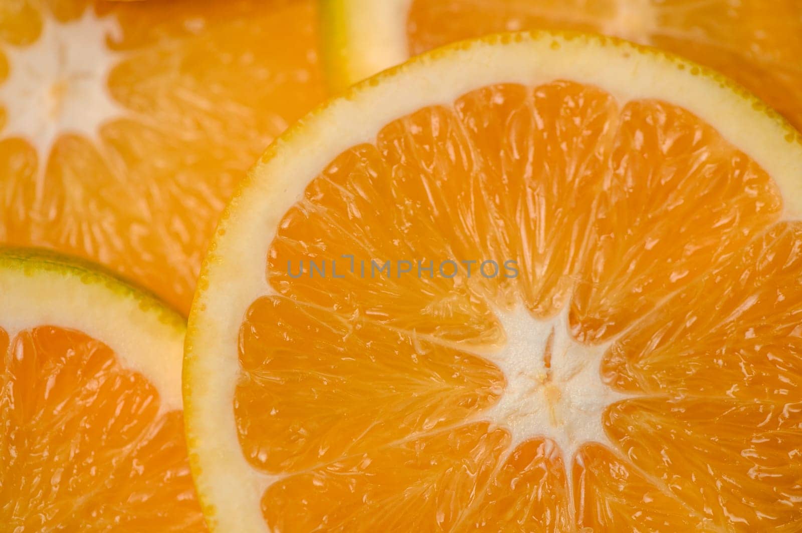 sliced ​​orange laid out on the table as a food background 13 by Mixa74