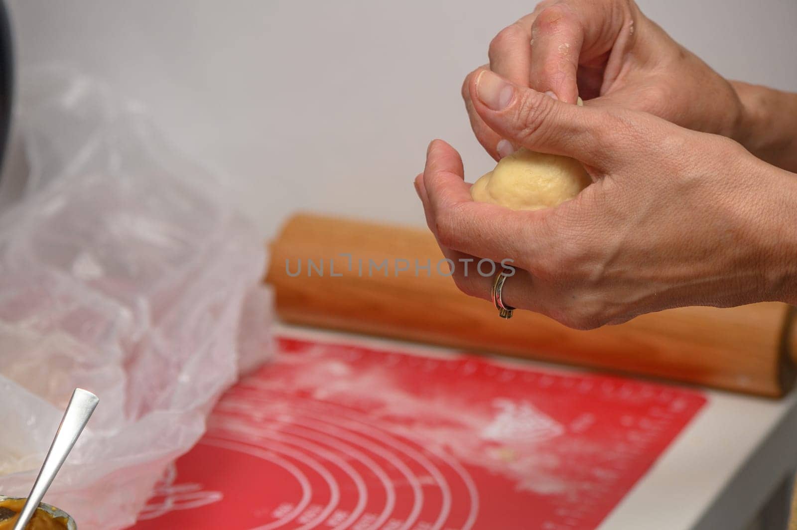 woman making buns in the kitchen 1