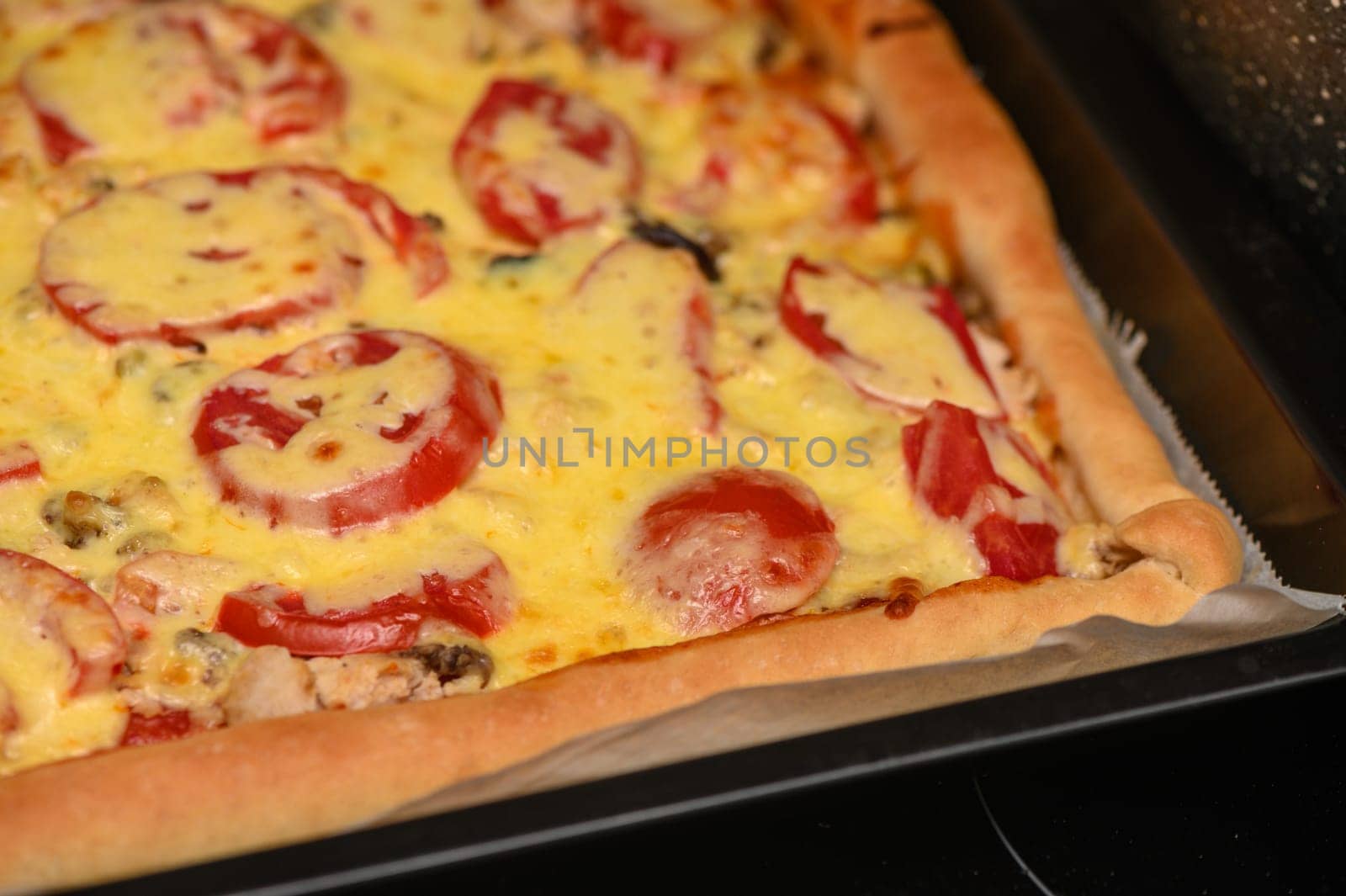 freshly baked pizza with cheese, tomatoes and chicken fillet 4