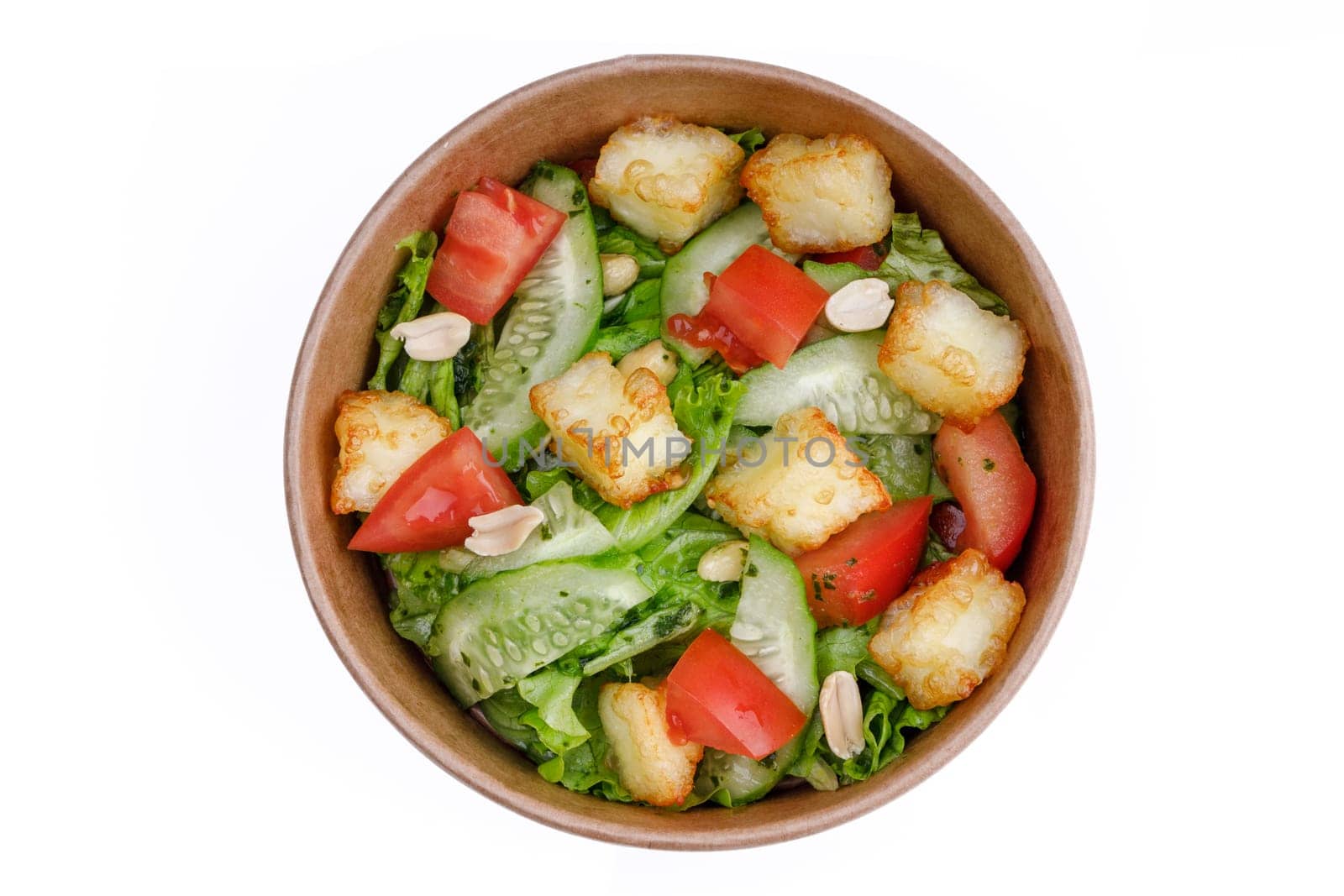 Salad with cheese, cucumber and tomatoes on a white background, for a food delivery site 1