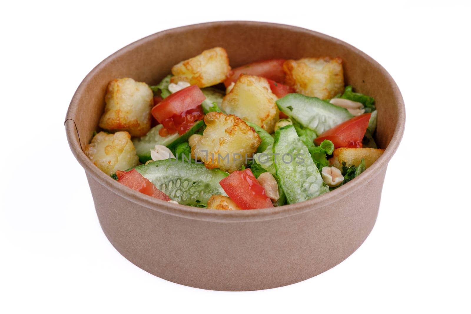 Salad with cheese, cucumber and tomatoes on a white background, for a food delivery site