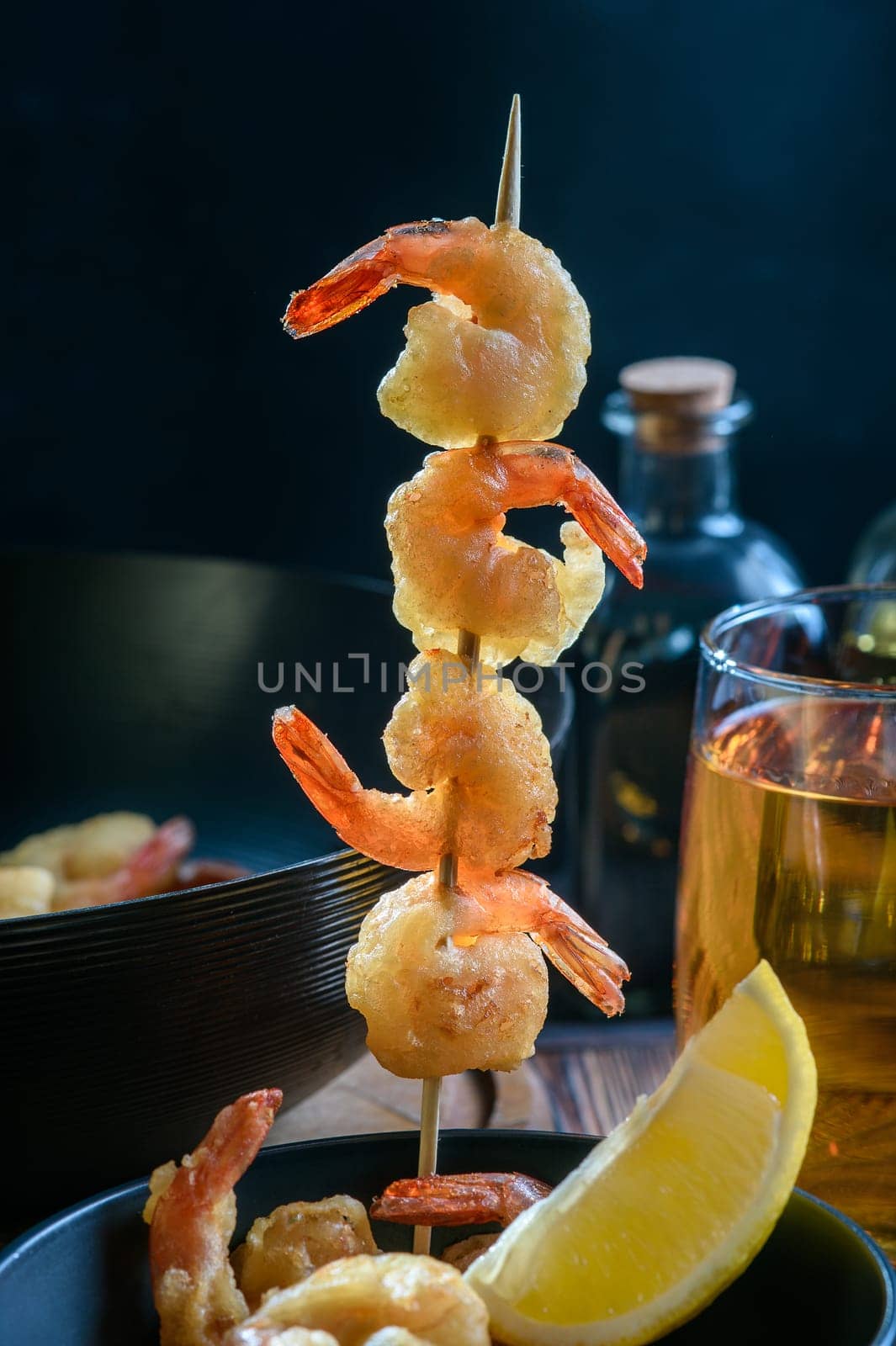 appetizing fried shrimp on the background of a frying pan with shrimp 1 by Mixa74