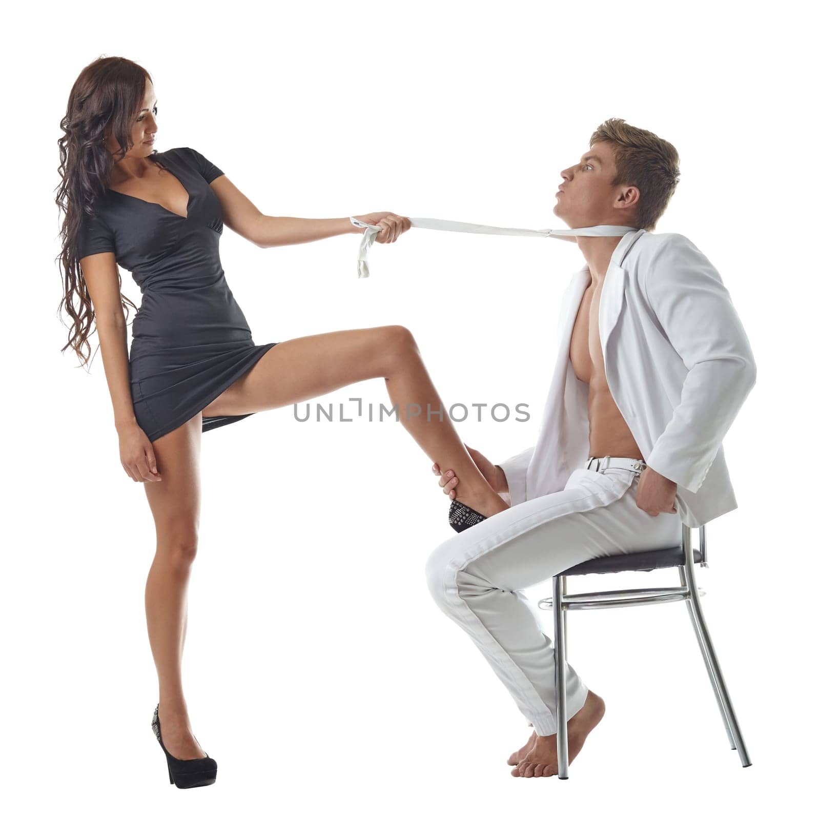 Beautiful stripper pulls man's tie, isolated on white