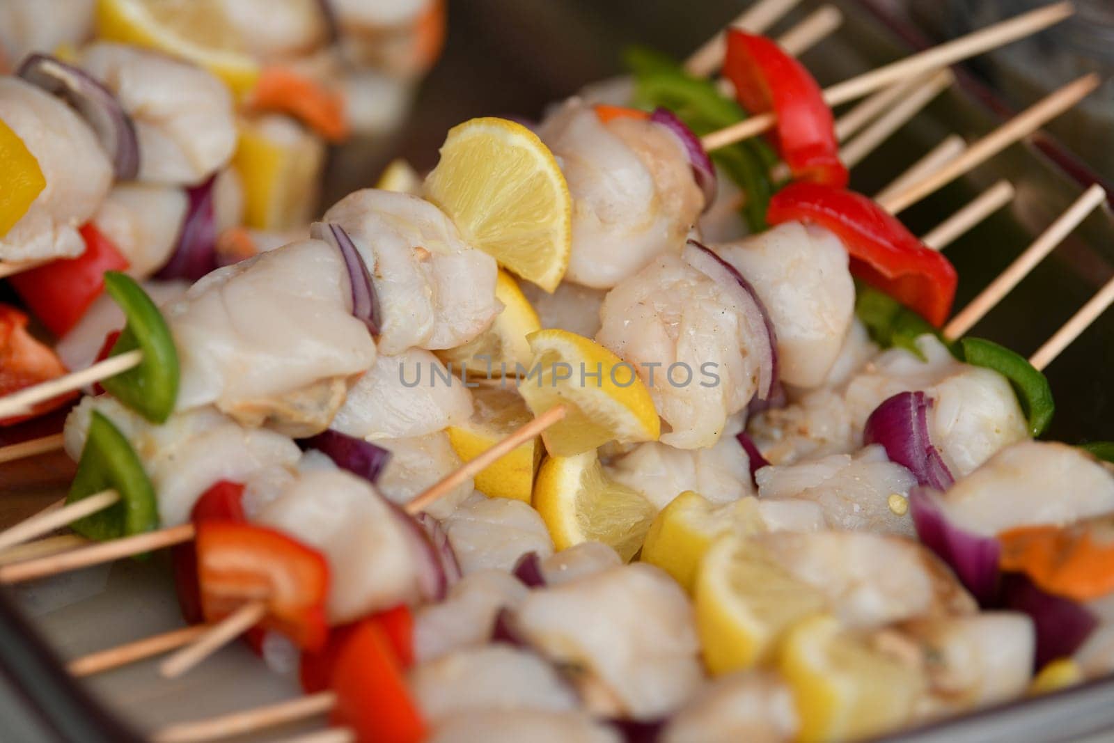 Grilled shells barbecue with lemon and pepper
