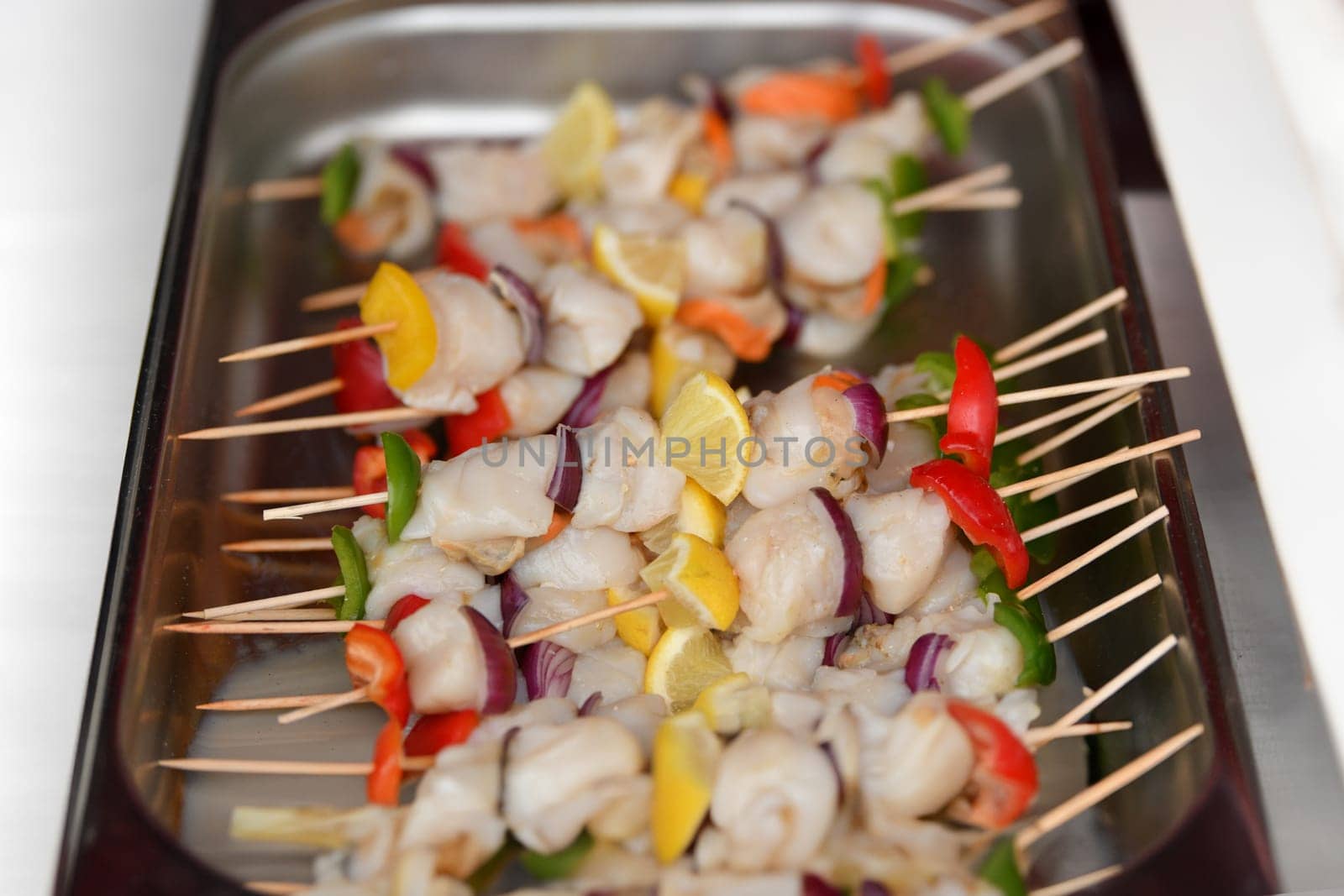 Grilled shells barbecue with lemon and pepper