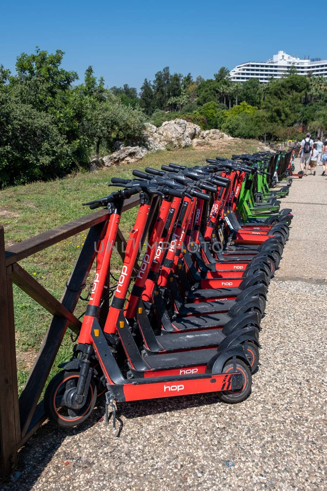 16.06.2023, Antalya, Turkey. Electric scooters for Public Use, Standing on a city street, Public mobile Transport. Electric scooters for rent, for rent An electric scooter is an economical vehicle