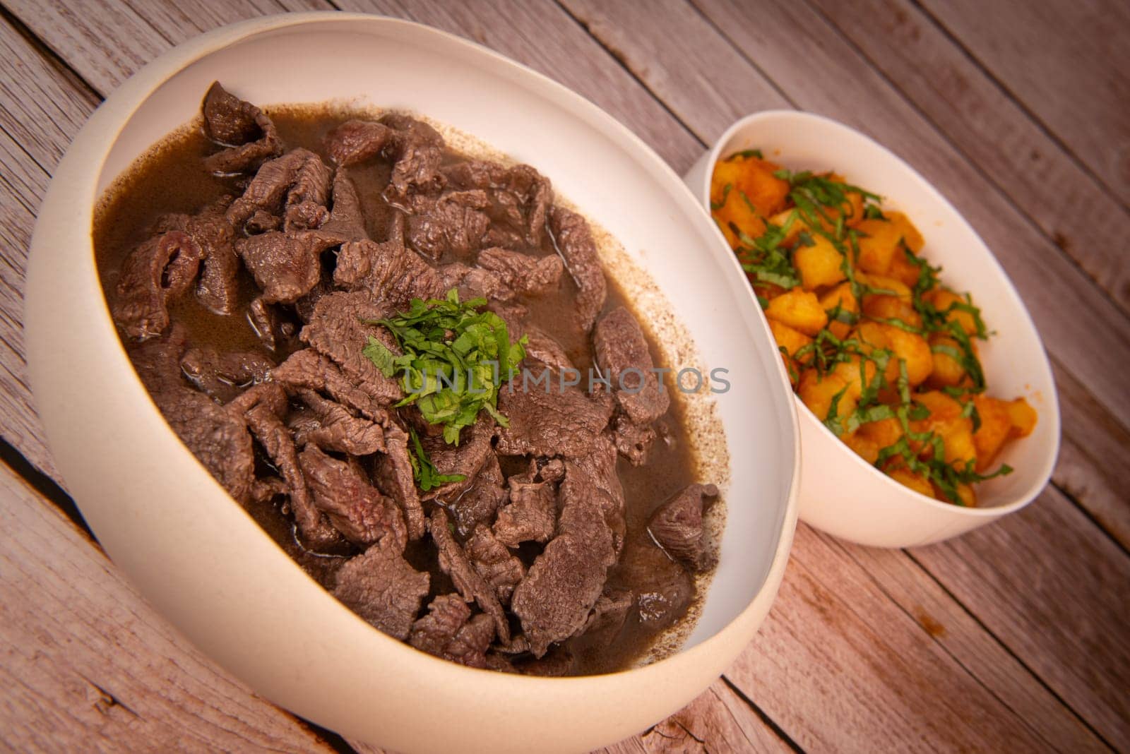 LEBANESE RECIPE, SHAWARMA, SPICY BEEF AND POTATOES, BATTATA HARA, GARLIC, CORIANDER AND PAPRIKA. High quality photo