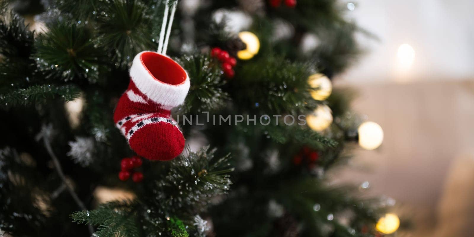 Background Christmas Tree and Stockings with Decorations Near a Fireplace with Lights by nateemee