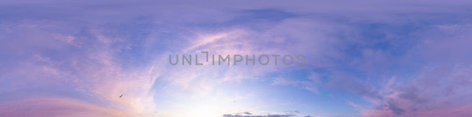 Bright sunset sky panorama with Cirrus clouds. Seamless hdr spherical equirectangular 360 panorama. Sky dome or zenith for 3D visualization, game and sky replacement for aerial drone 360 panoramas.