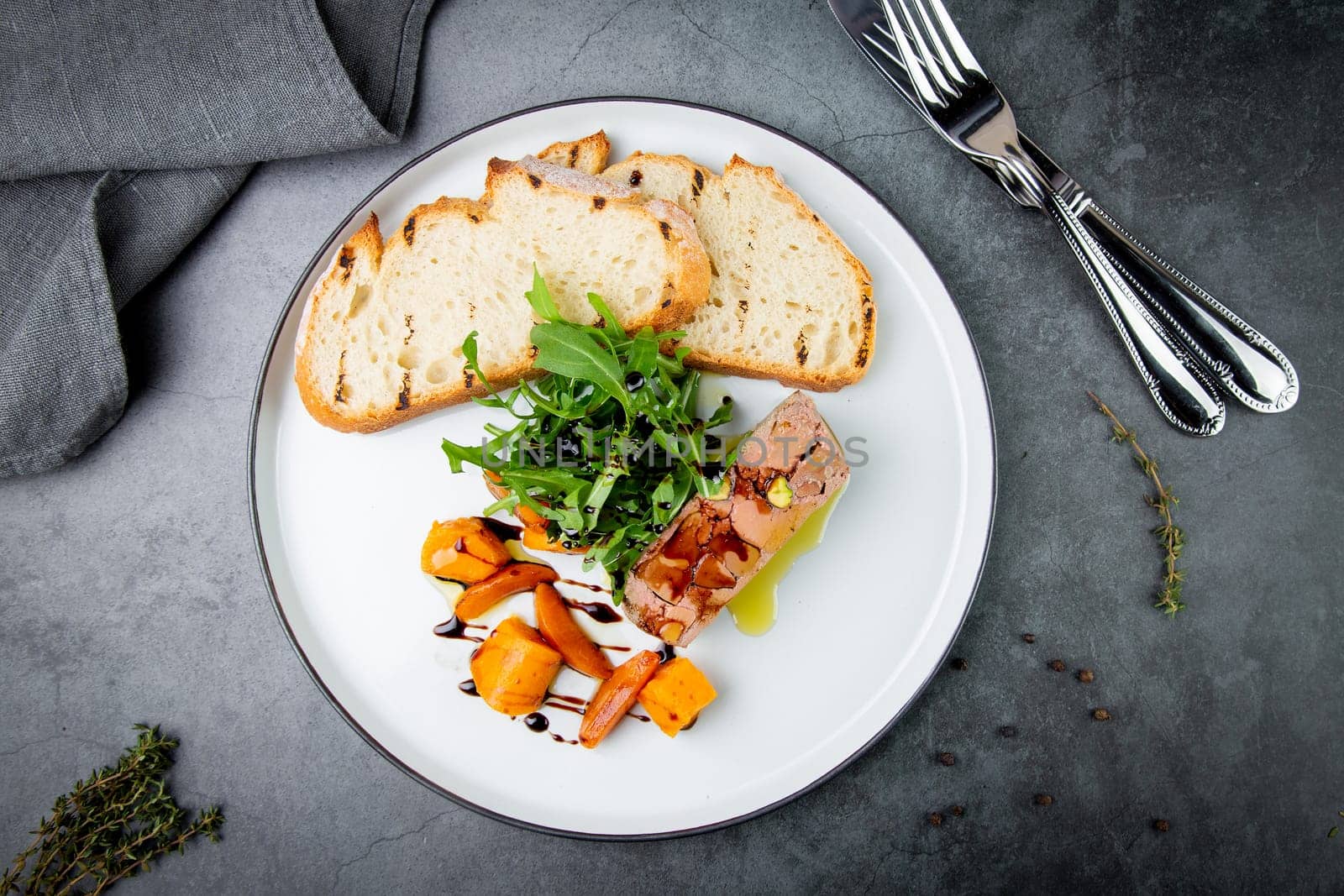 arugula with crusty bread and pate sauce, side view by tewolf