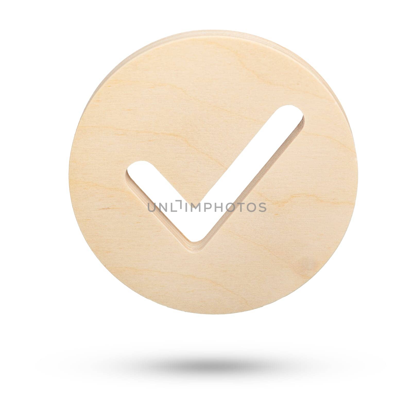 Check mark symbol on white isolated background. A large wooden round check mark sign is falling down casting a shadow. High quality photo for a design or project. by SERSOL