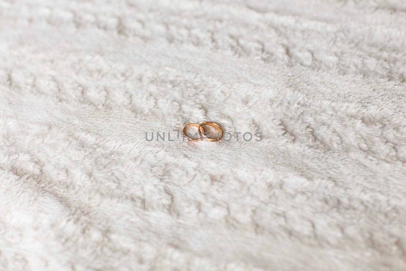 Close-up of wedding rings by Satura86