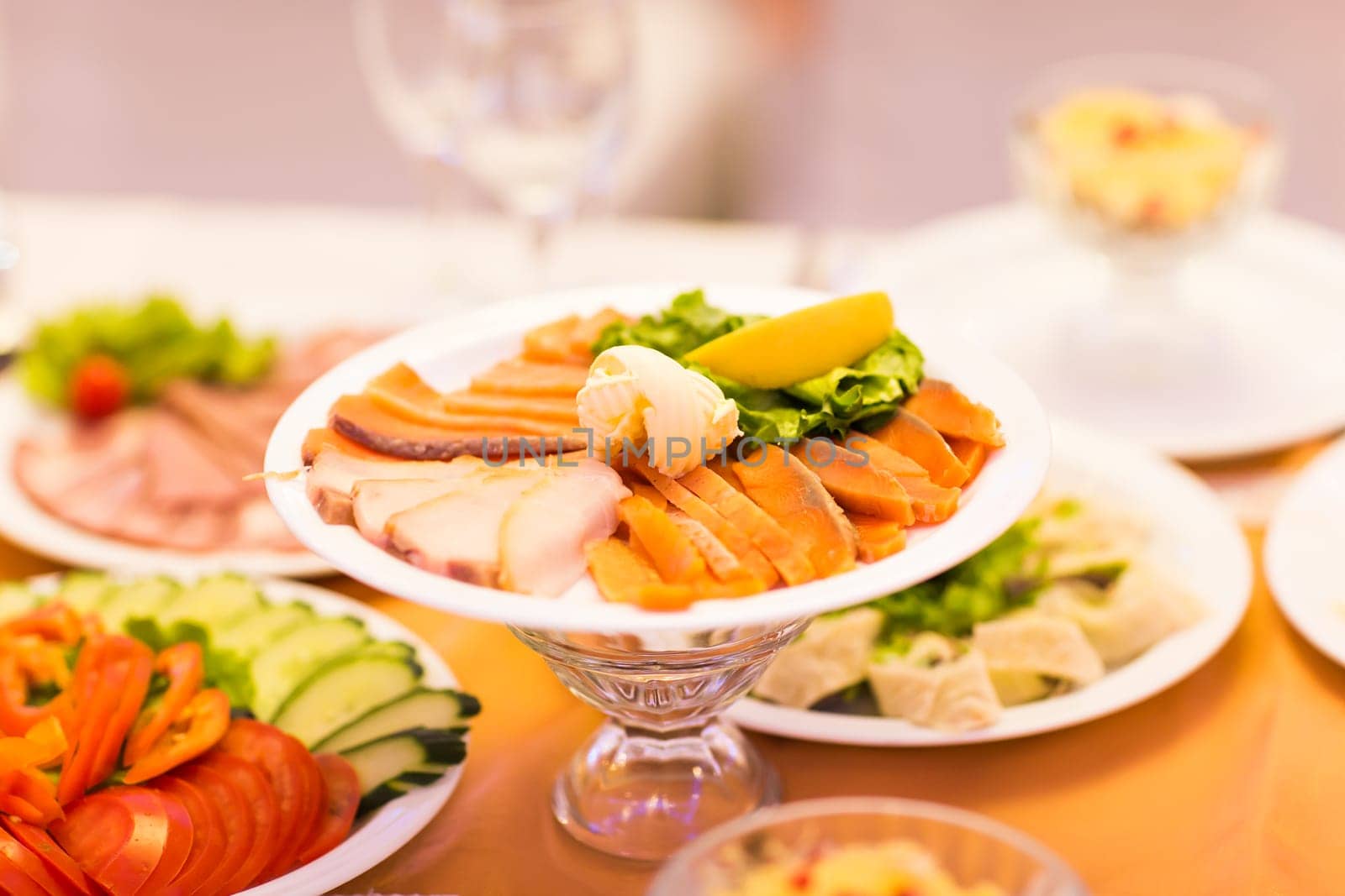 Assorted fish on a plate on festive table