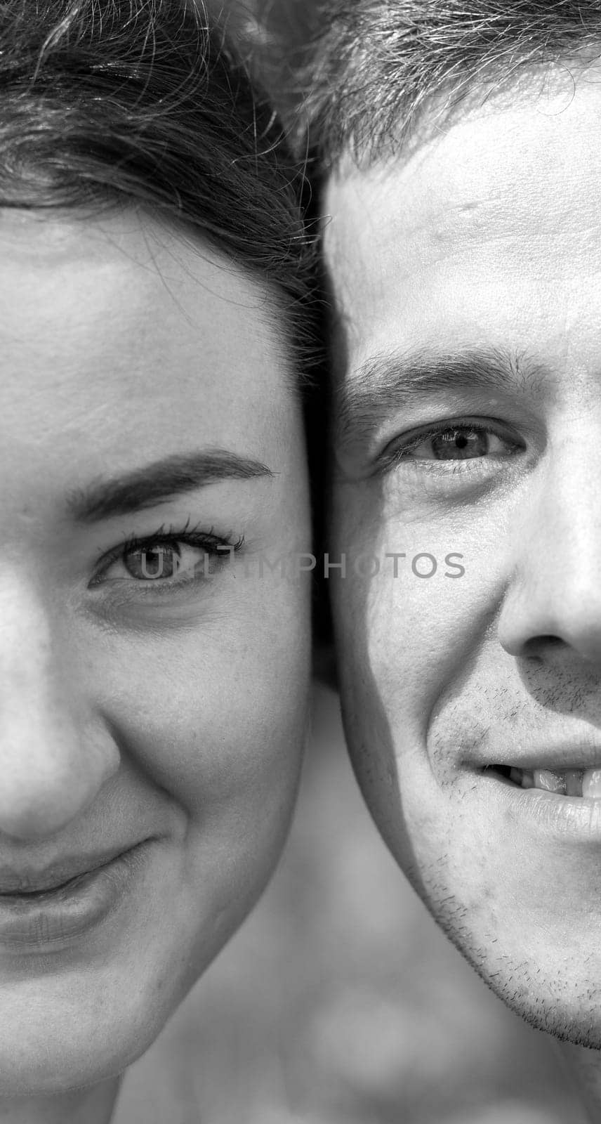 Close-up of the man and woman's face close to each other. by AnatoliiFoto