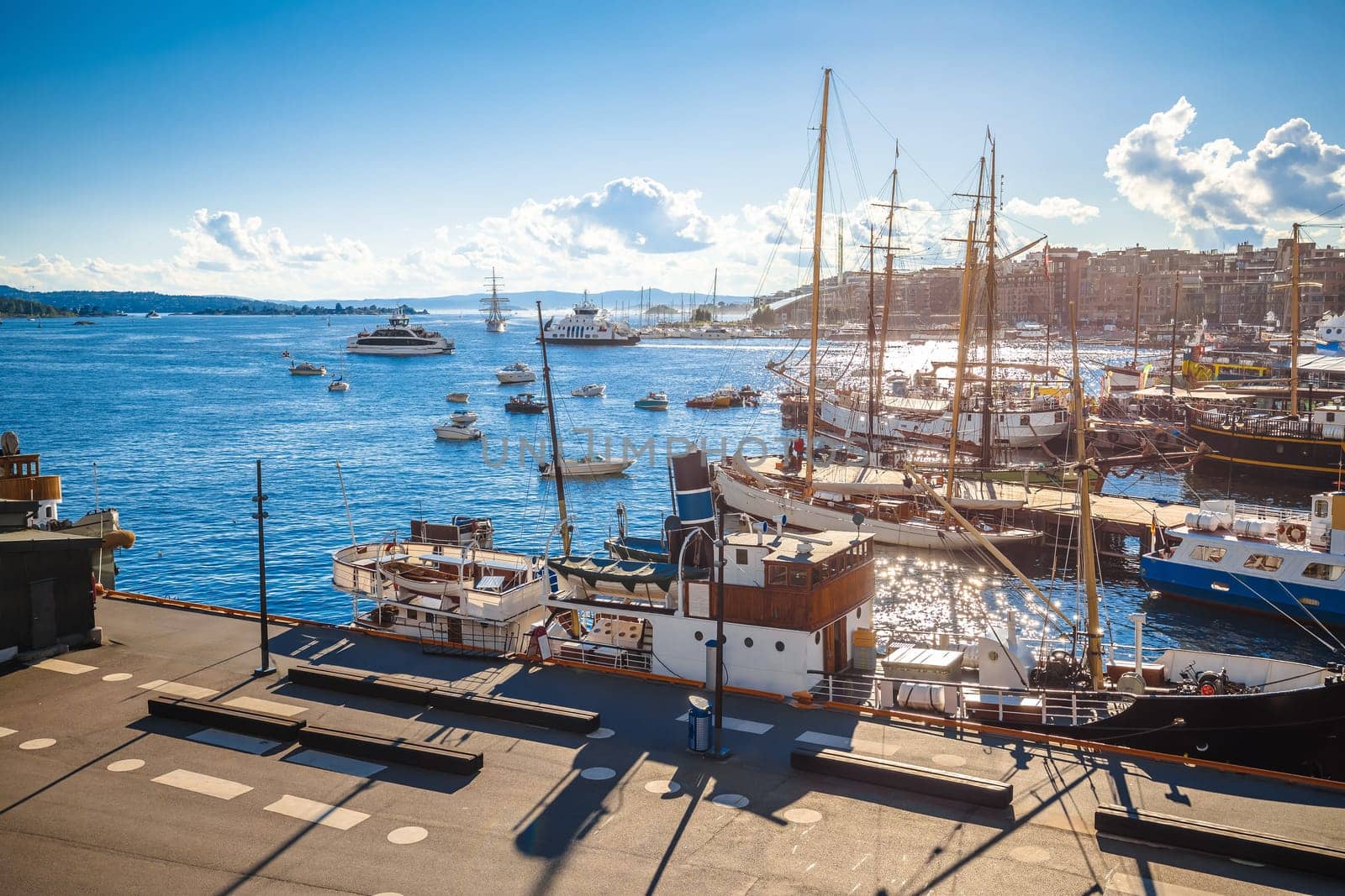 Scenic harbor of Oslo in Aker Brygge view from the hill by xbrchx