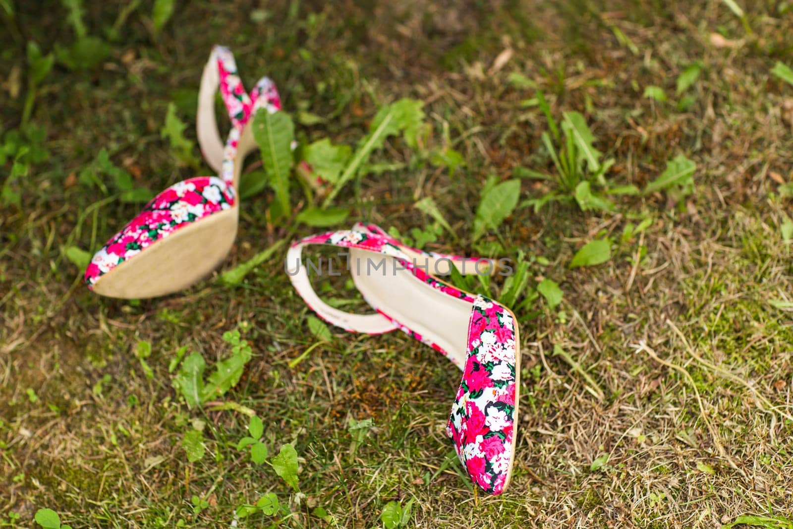 Close up of a pink high heels shoes.