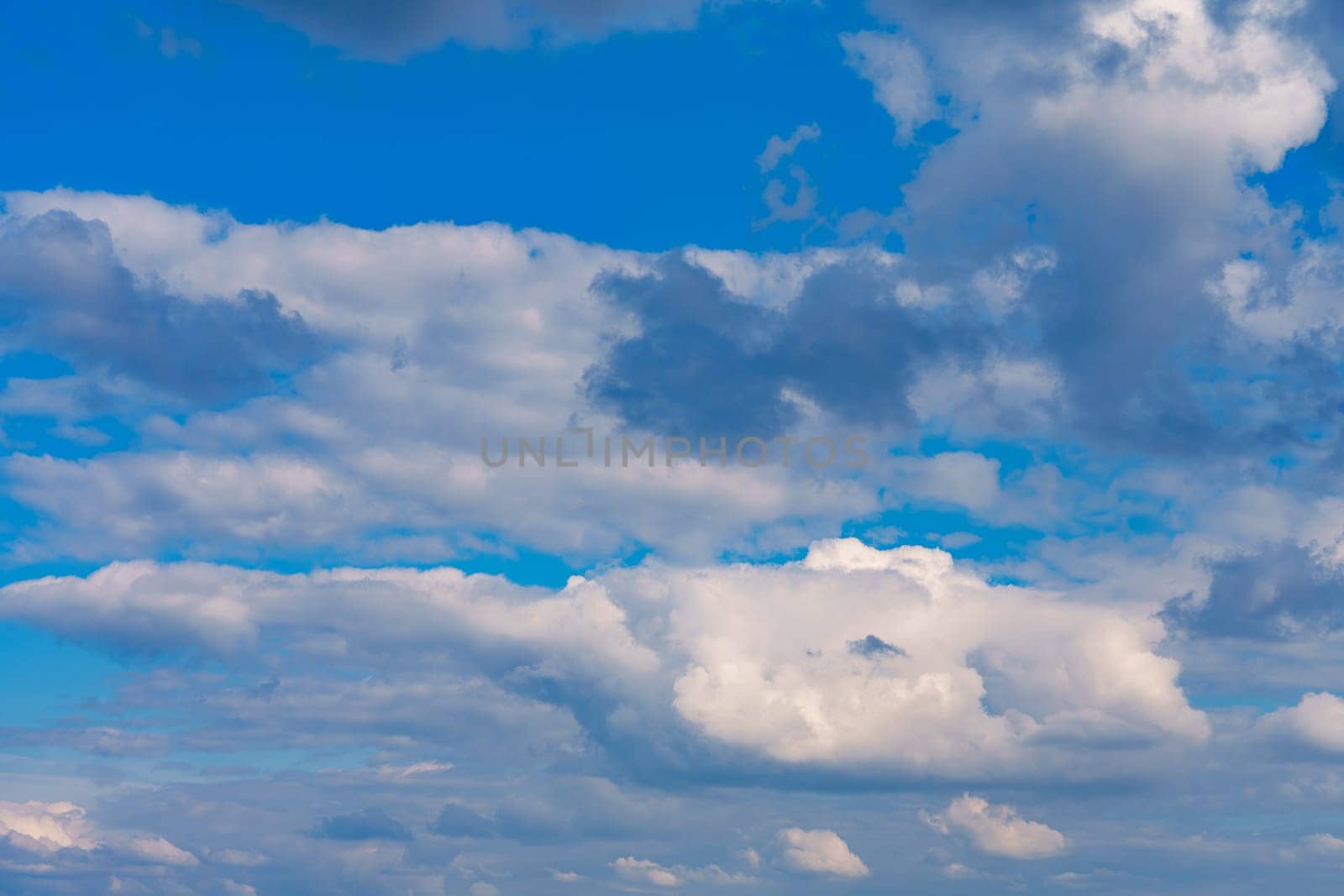 Blue Sky with Lots of White Clouds: Background for Replacement or Inspiring Ideas.