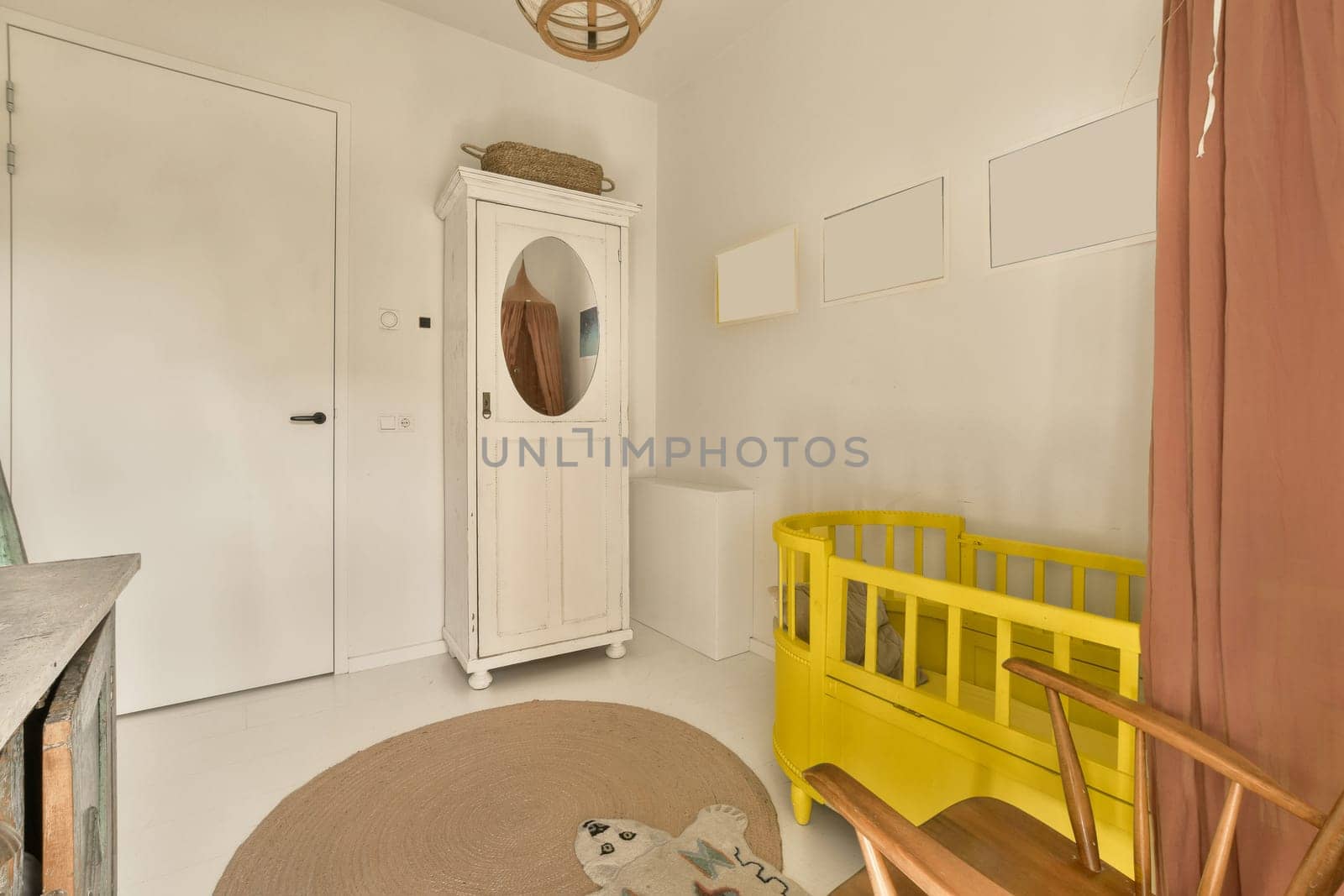 a yellow bench in the corner of a room with a mirror on the wall and door to the other room