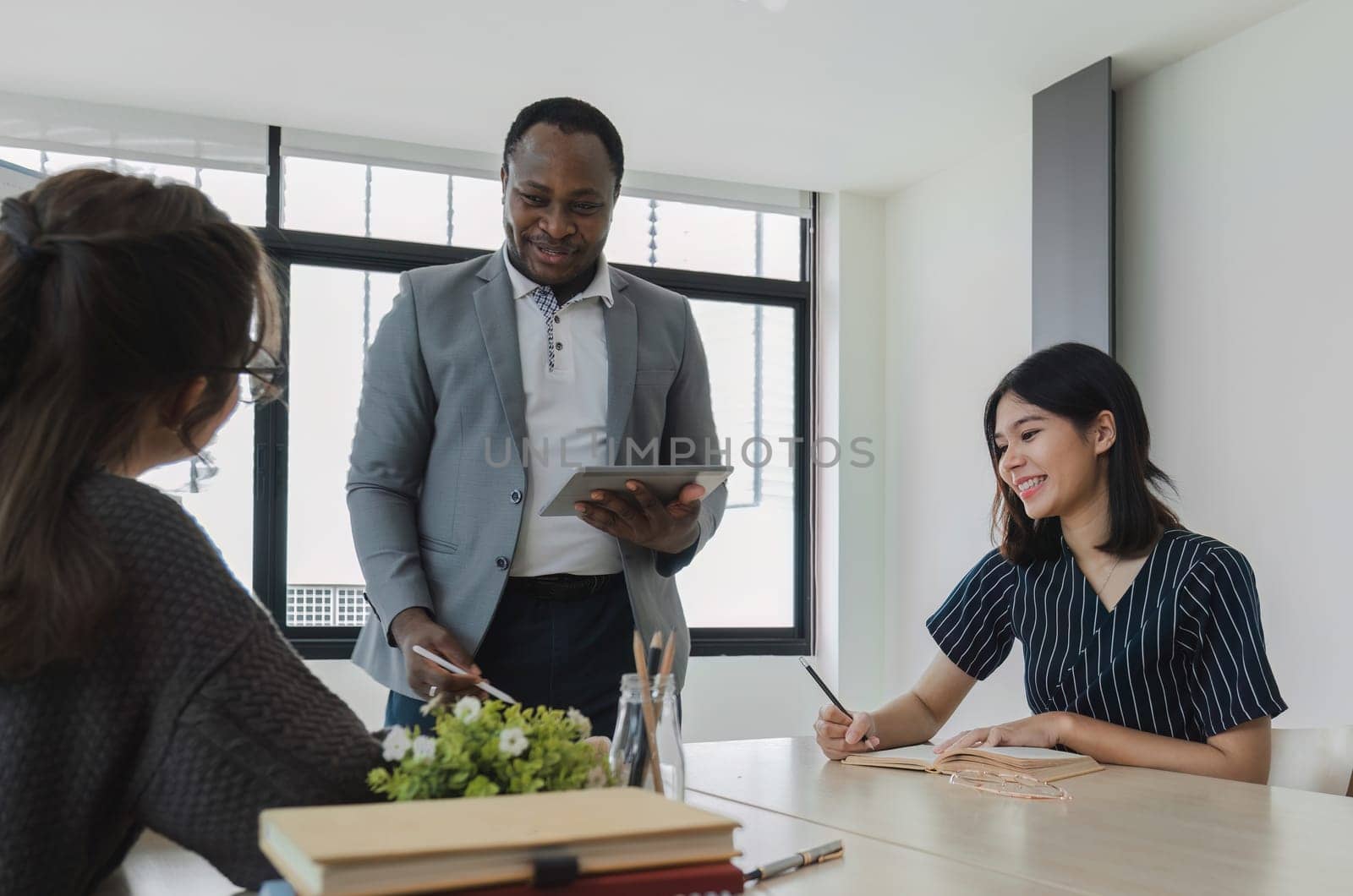 Asian college students' language classes study with foreign teachers..