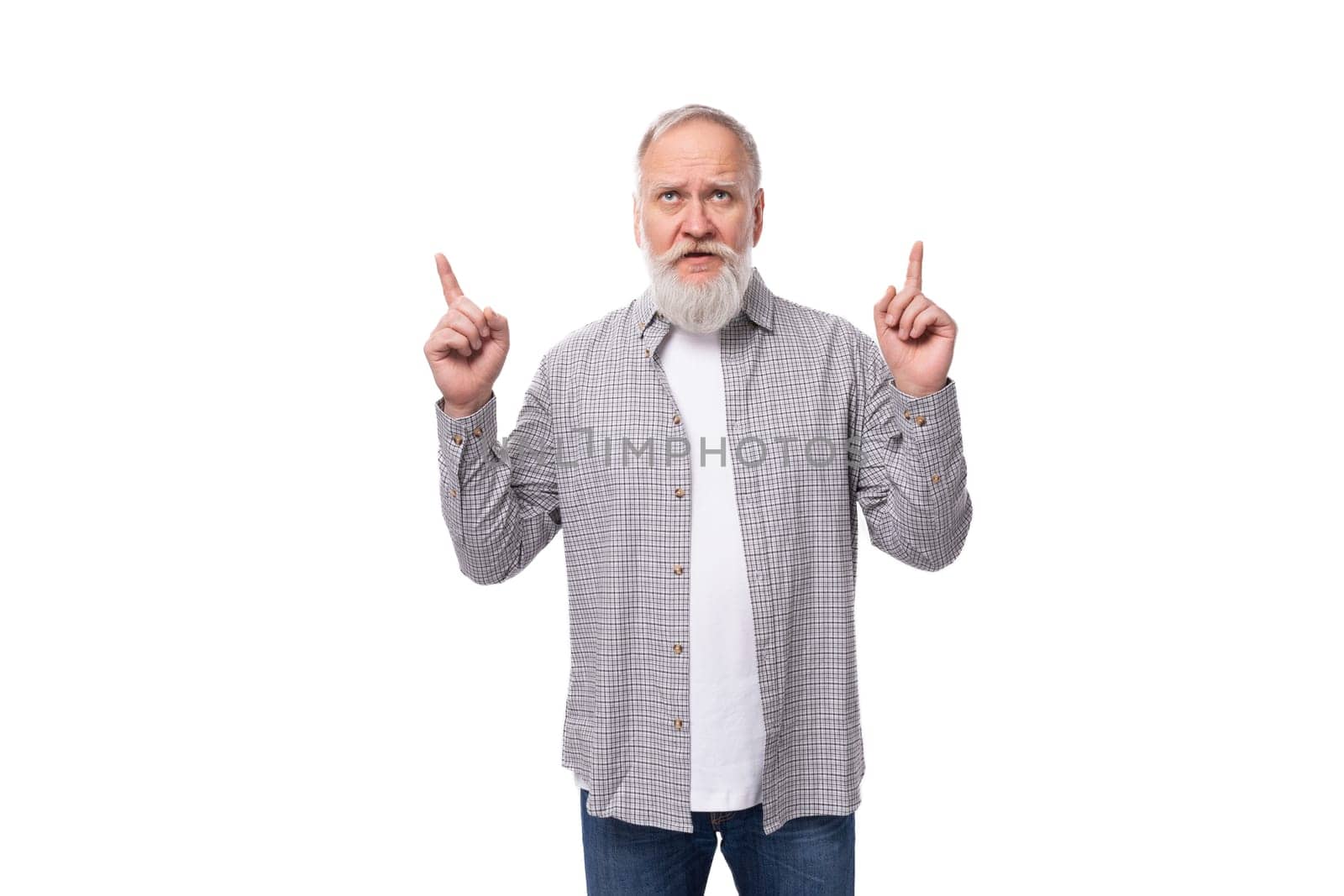stylish mature man with a white beard and mustache dressed in a plaid shirt over a white t-shirt.