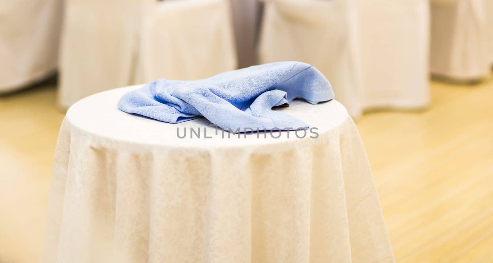 Crumpled towel on the table. House choirs concept