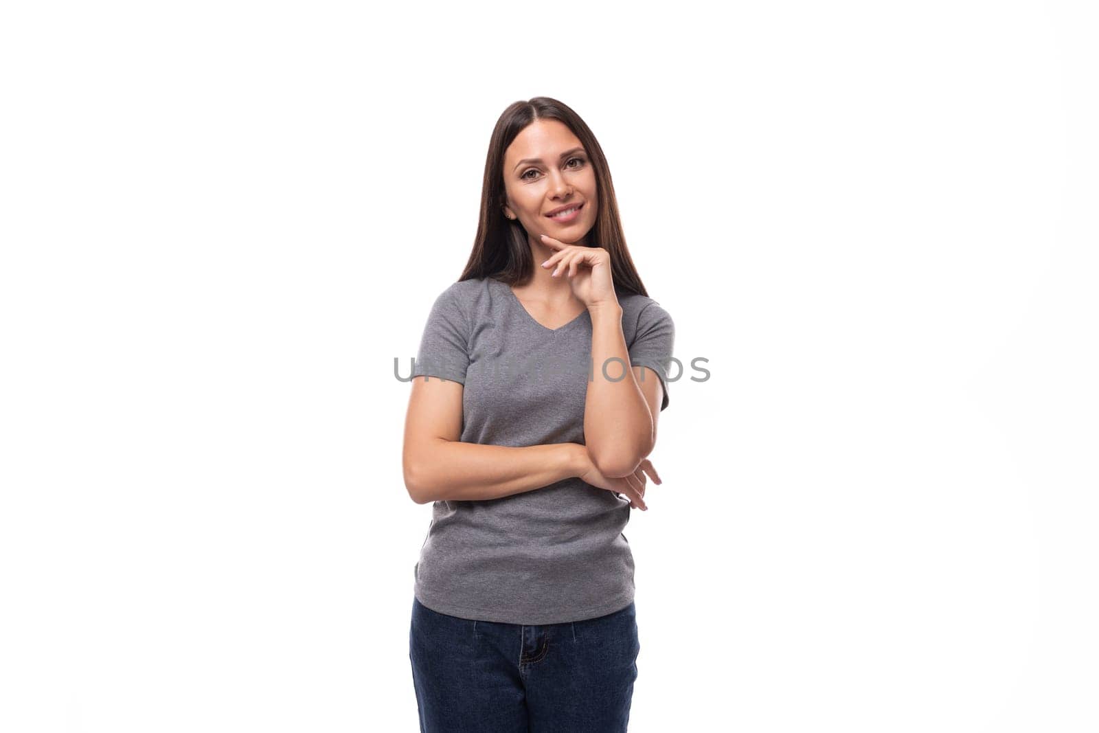 young slim brunette promoter woman dressed in a gray basic t-shirt with print mockup. uniform concept.