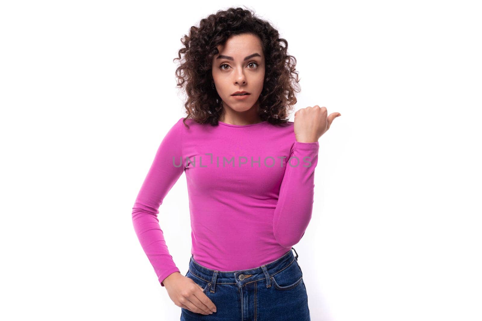 young woman working in advertising dressed in a lilac turtleneck on a white background with copy space by TRMK