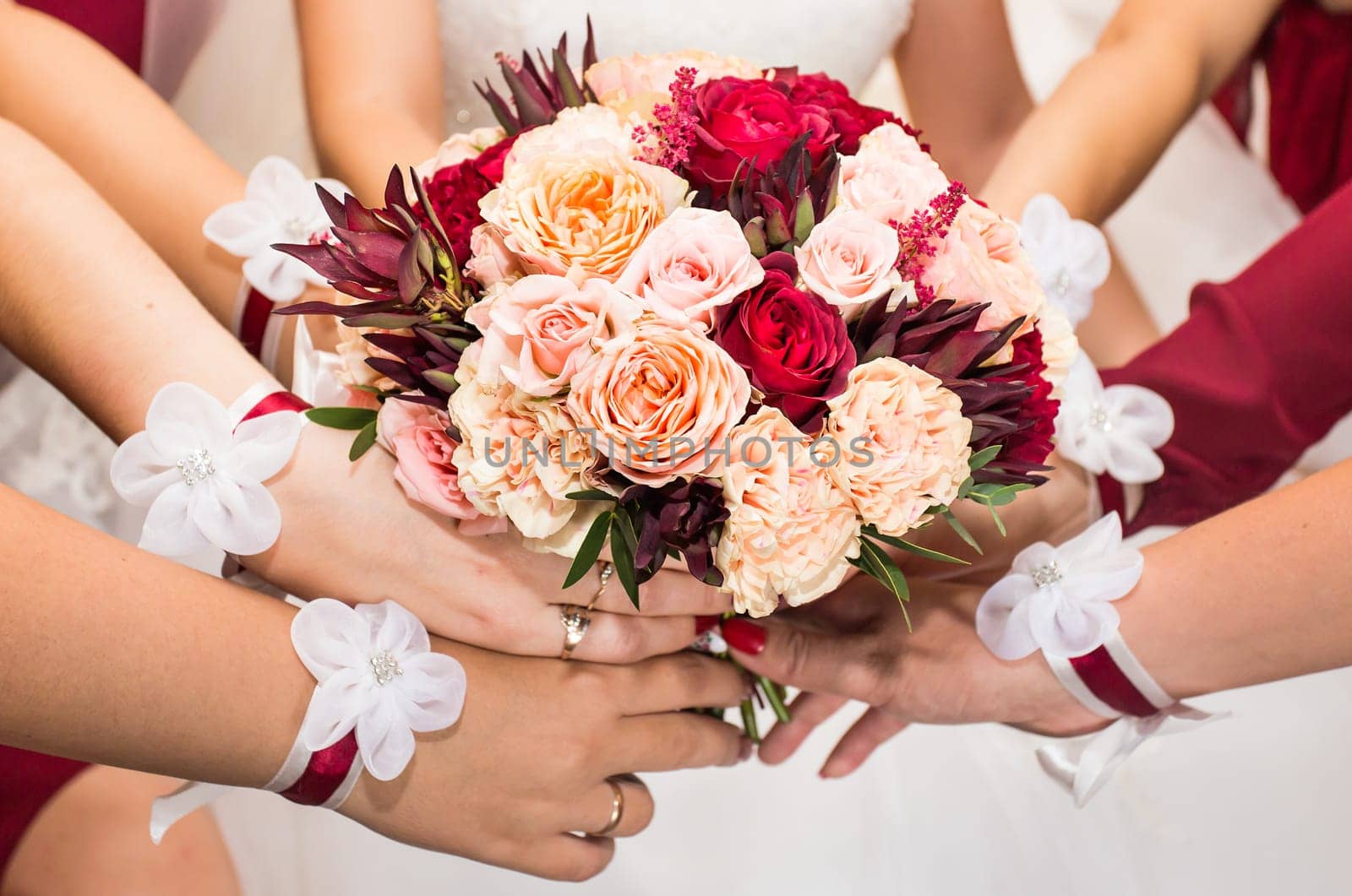 Close up of bride and bridesmaids bouquet by Satura86