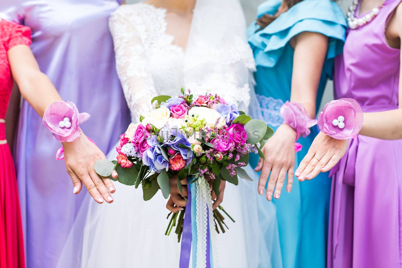 Close up of bride and bridesmaids bouquet by Satura86