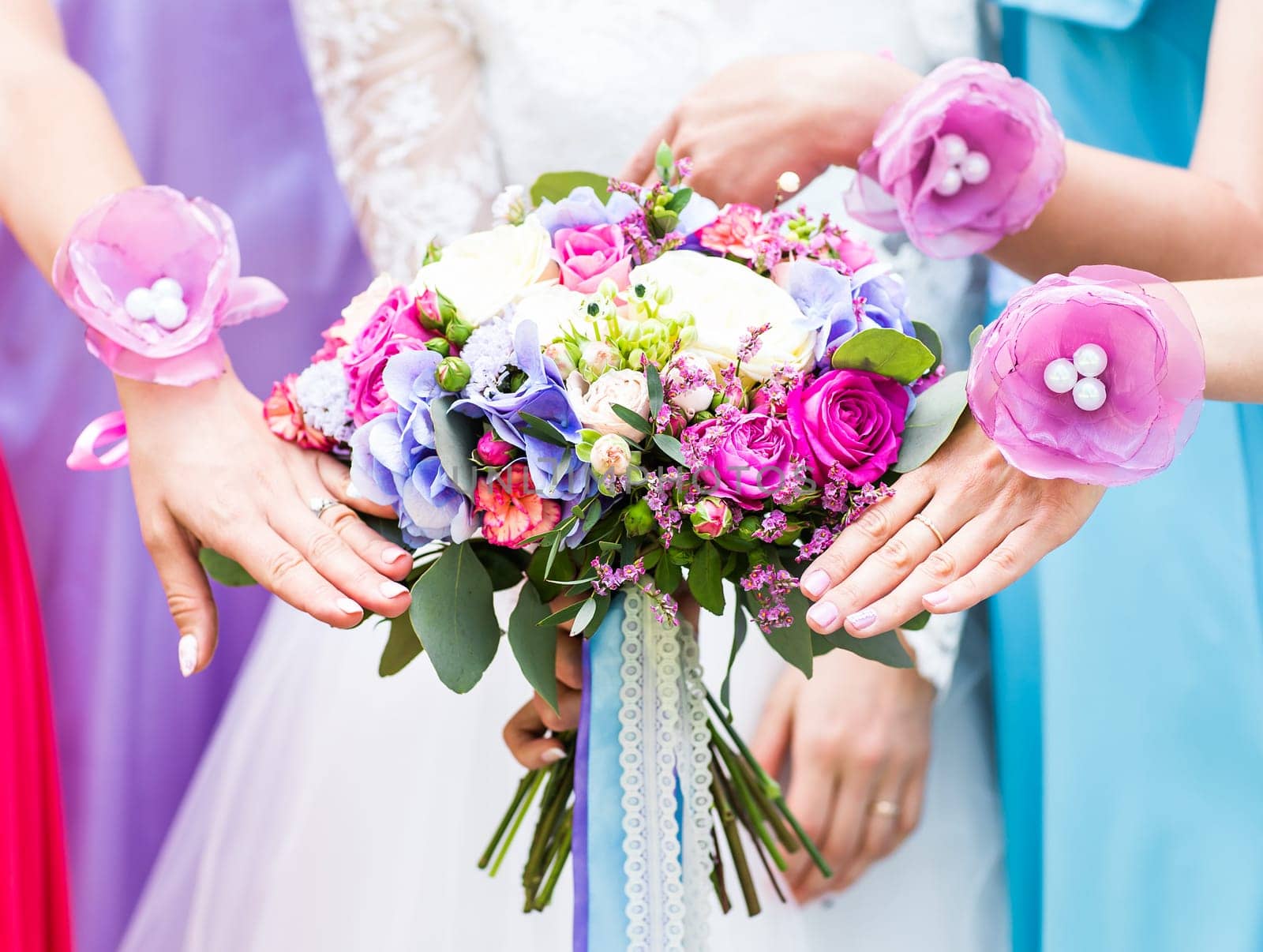 Close up of bride and bridesmaids bouquet by Satura86